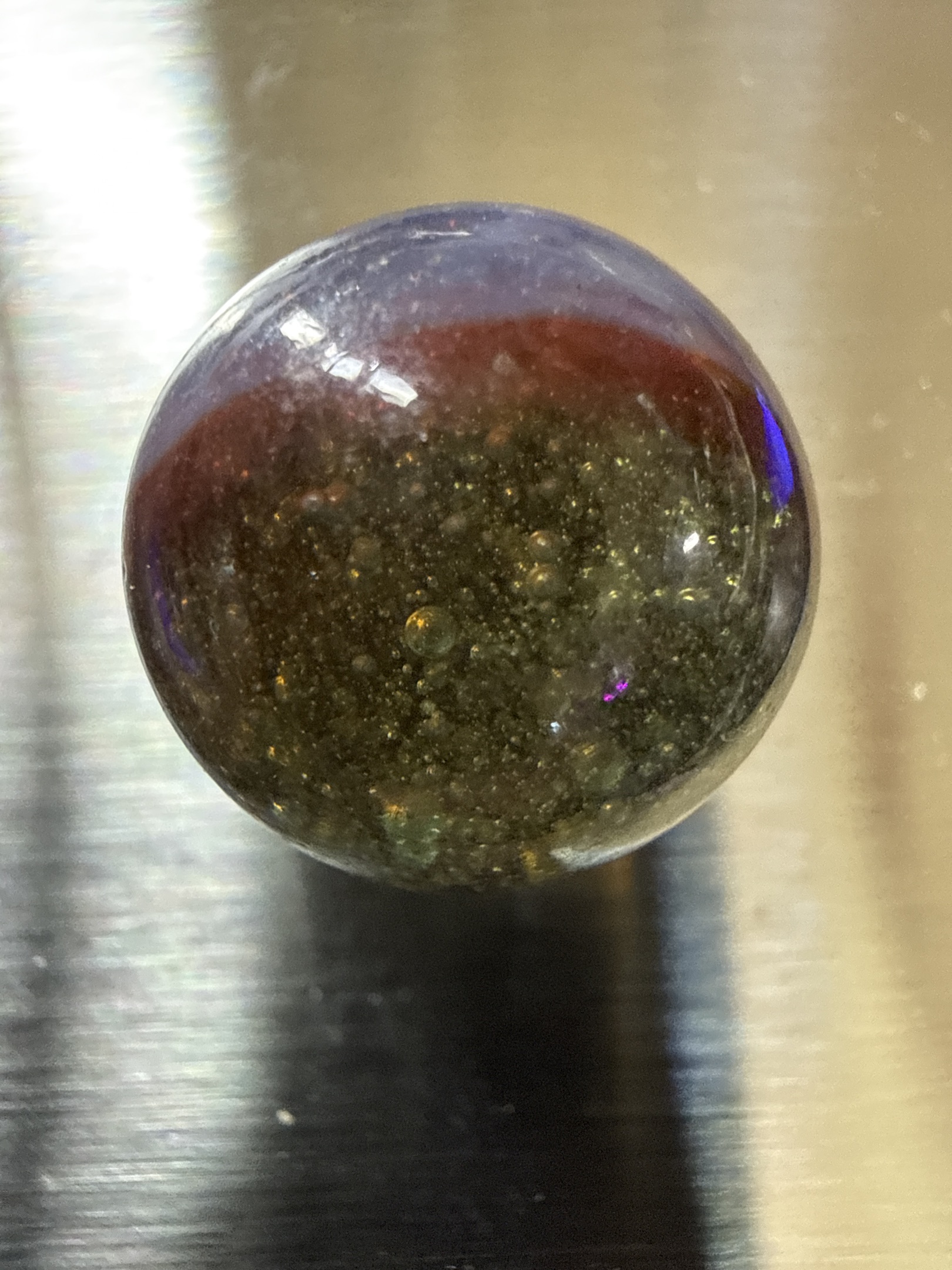 Amber and Green Sparkler by Akro Agate Company, identification view