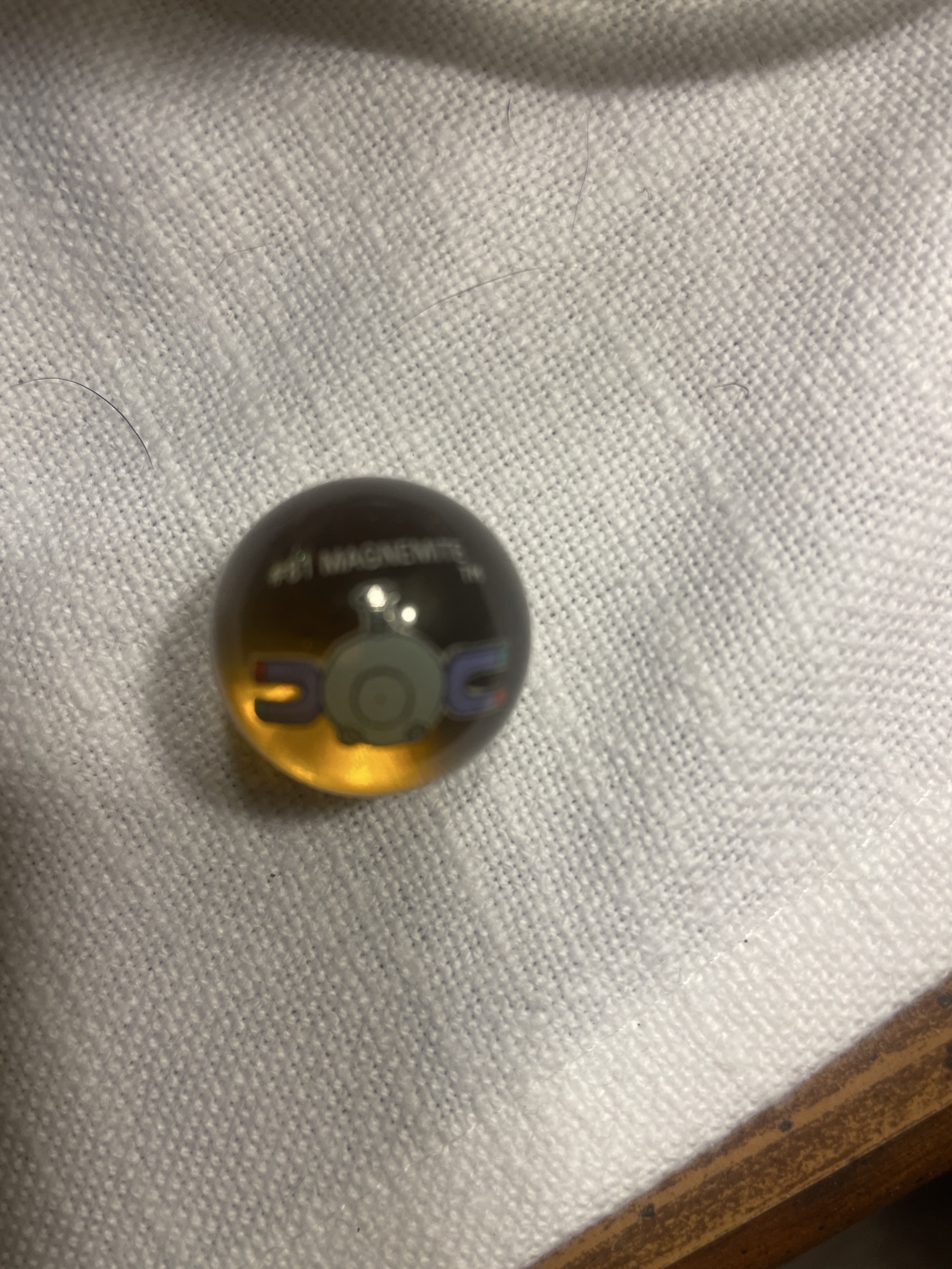 Magnemite #81 (Amber Translucent) by Vacor de Mexico (Distributed by Hasbro)