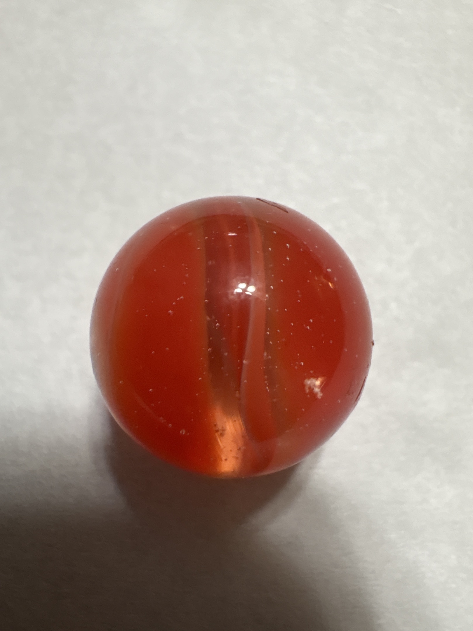 Red Opaque Cat's Eye - Red Devil by Vitro Agate Company, identification view
