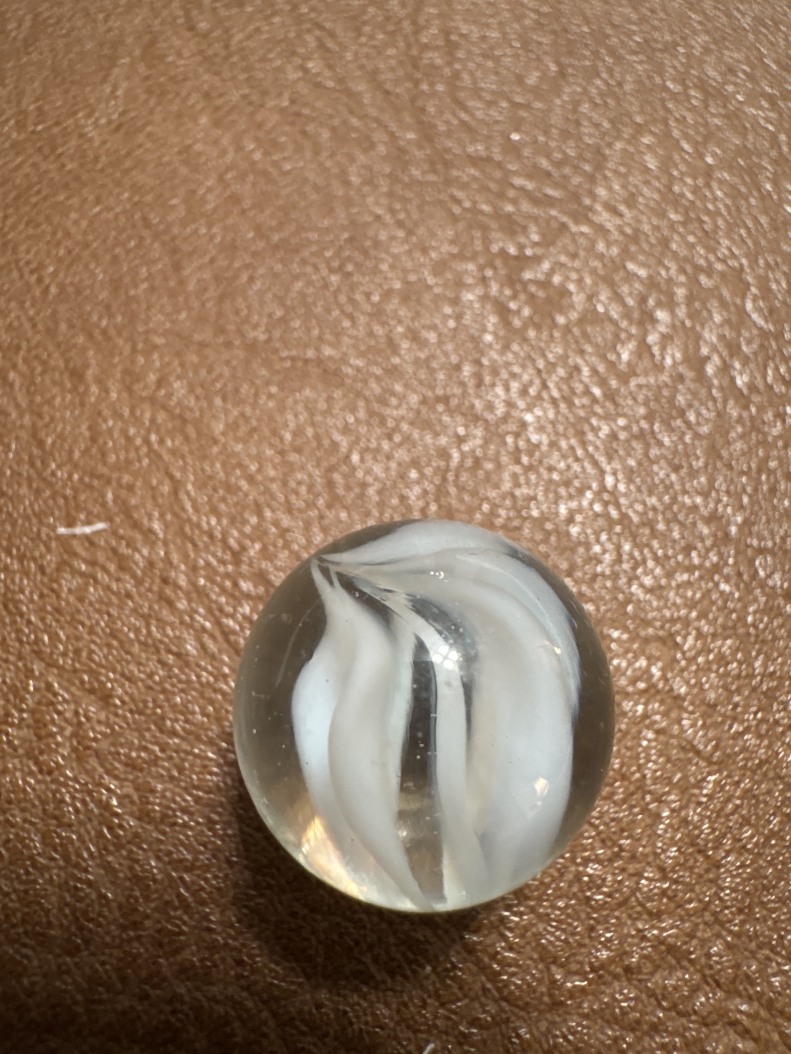 White Feather Swirl / White Swirl Clearie by Vitro Agate Company, identification view