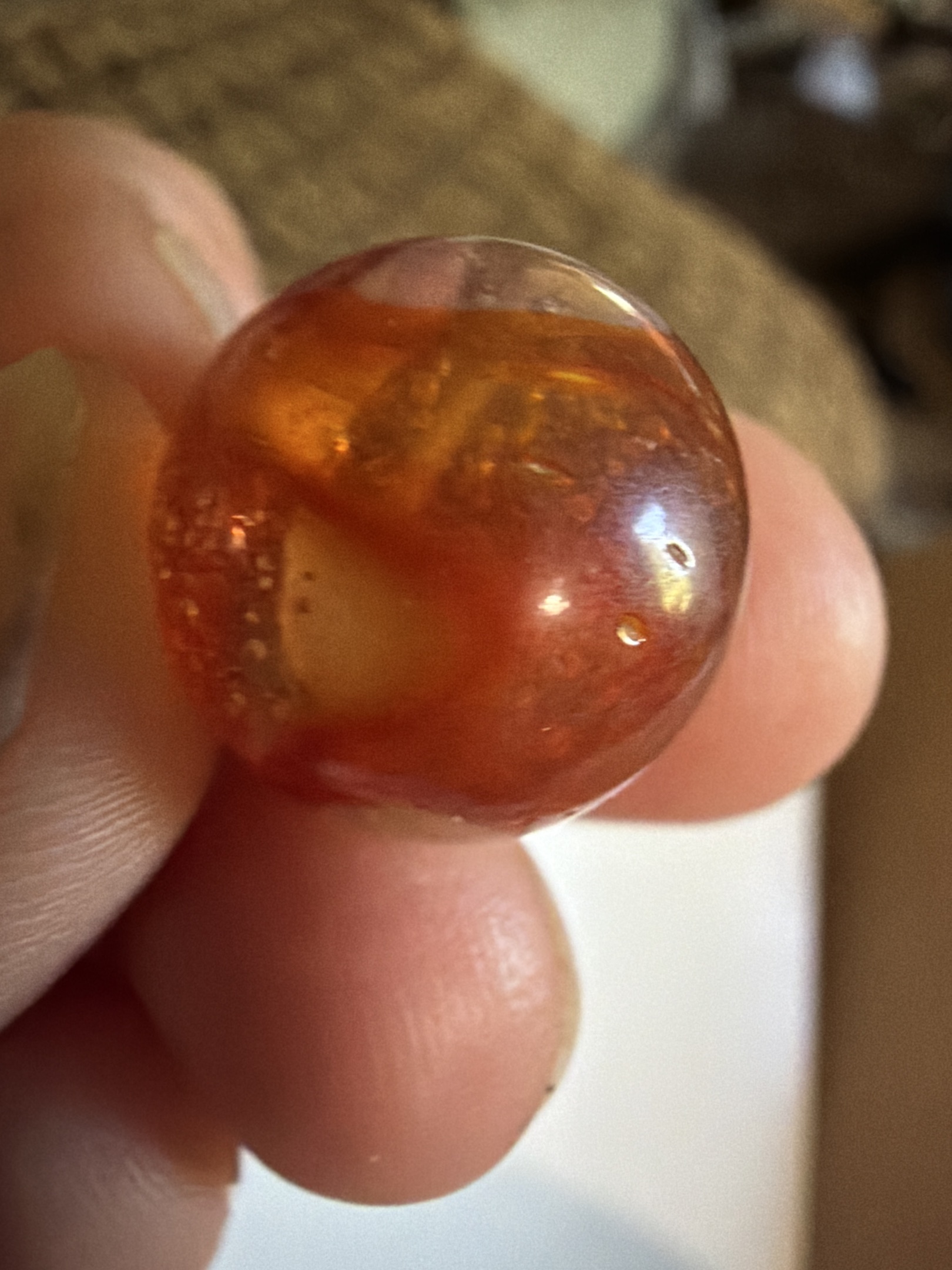 Amber and Red Clearie Swirl by Akro Agate, identification view