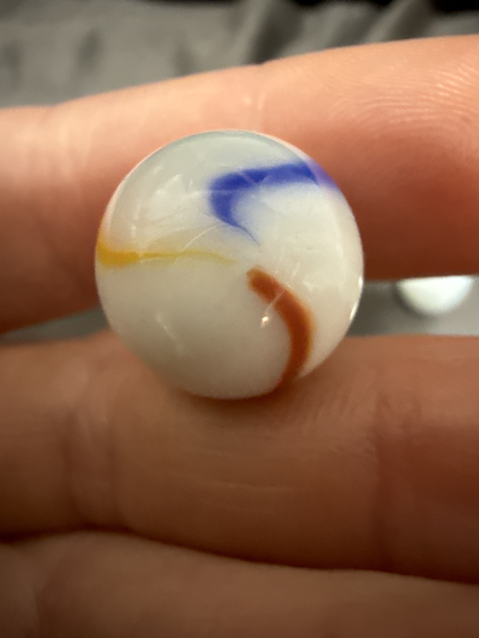 Tri-Lite (White Base with Red, Yellow, and Blue Swirls) by Vitro Agate Company