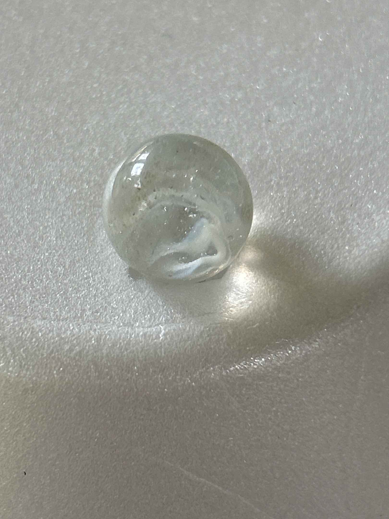 Clear with White Swirl by Akro Agate Company, identification view