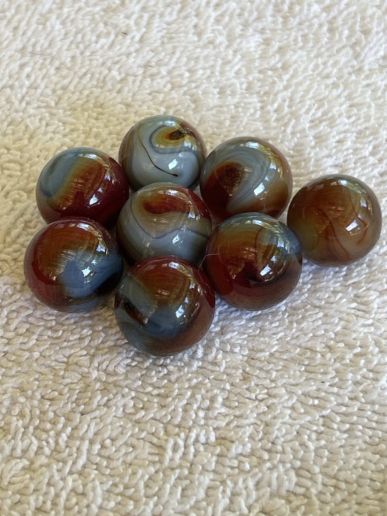 Silver Oxblood by Akro Agate Company, identification view