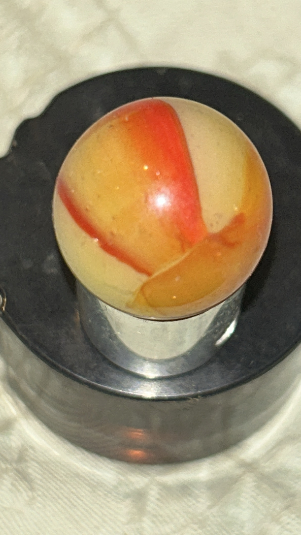 Citrus / Orange-Red Swirl by Peltier Glass Company, identification view
