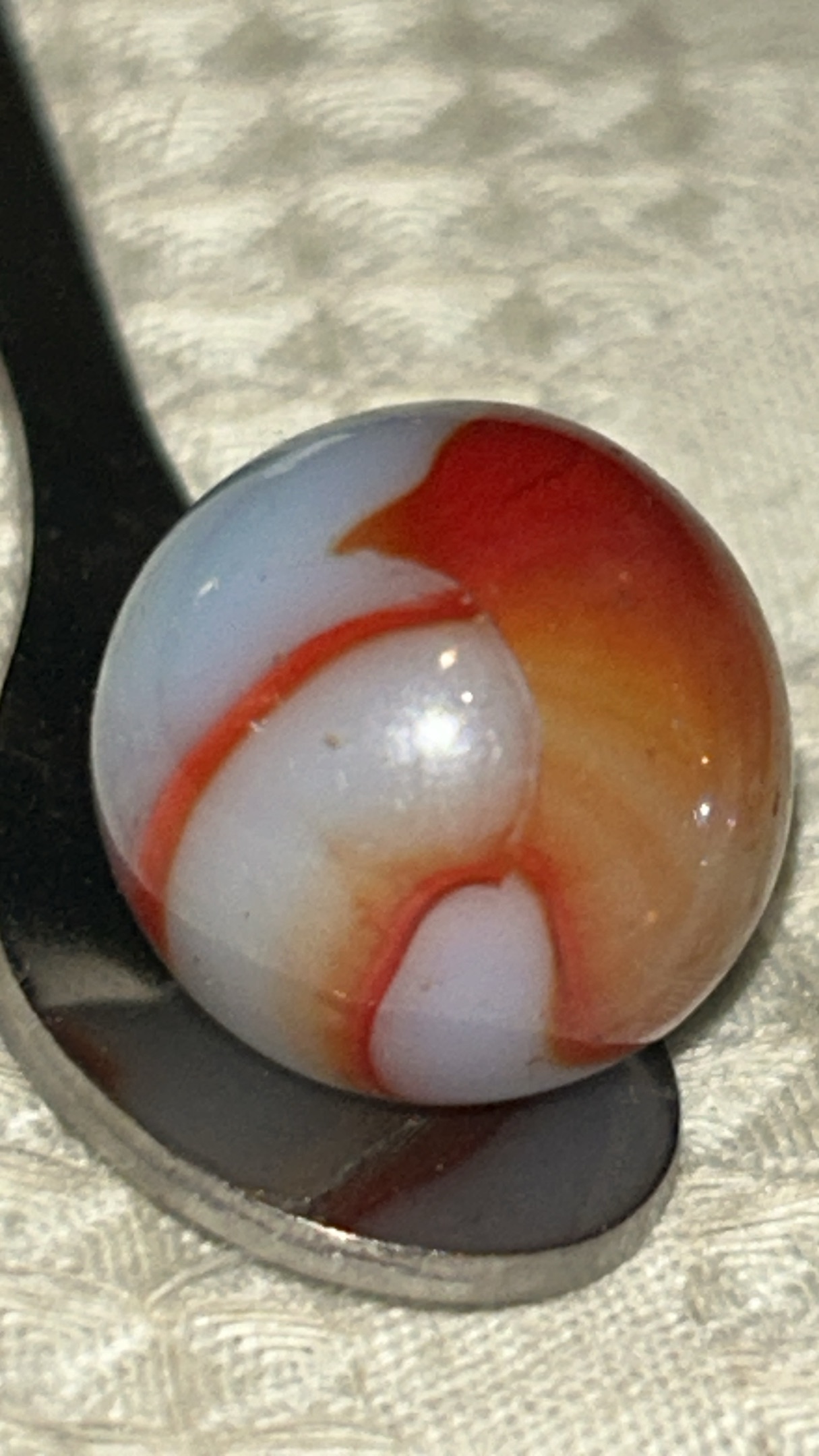 Orange and White Flame Swirl by Christensen Agate Company, identification view