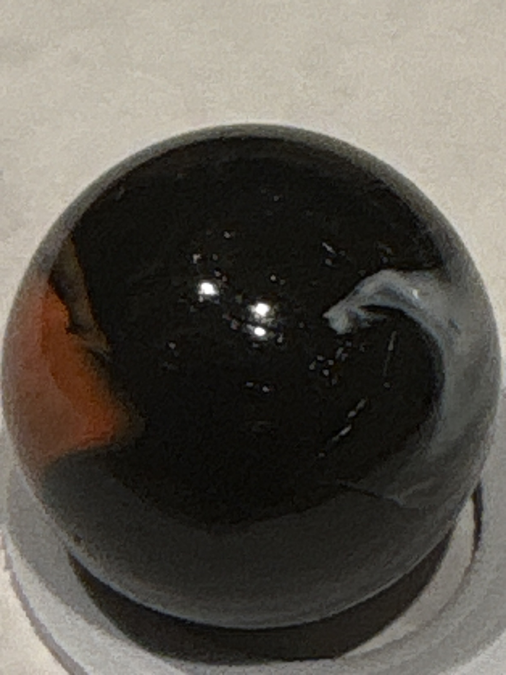 Christensen Swirl (Orange & White on Black/Dark Base) by Christensen Agate Company, identification view