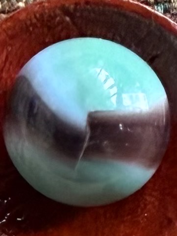 Aqua, White, and Dark Purple Conqueror by Vitro Agate Company