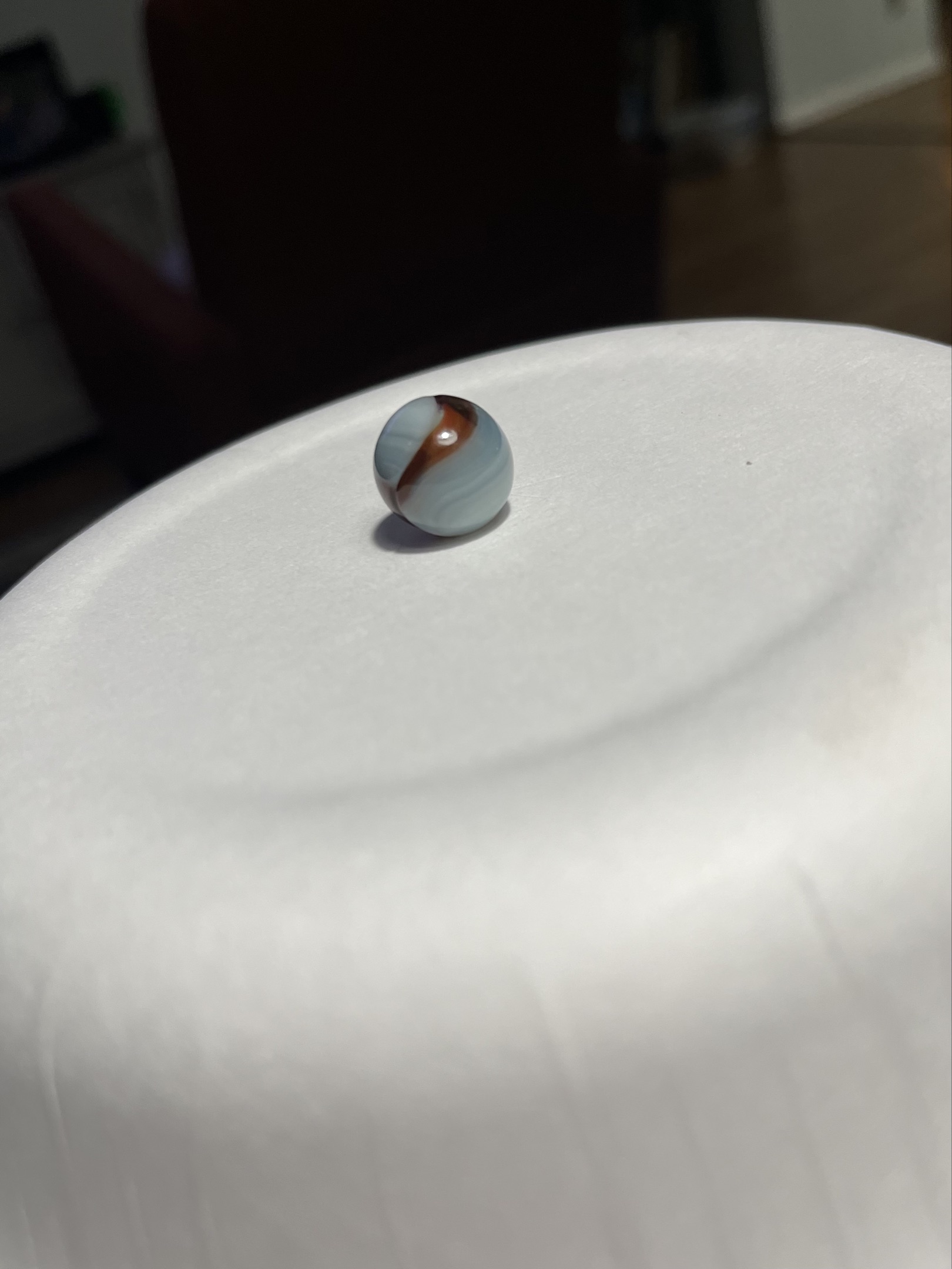 Red/Brown on Light Blue-White by Akro Agate Company