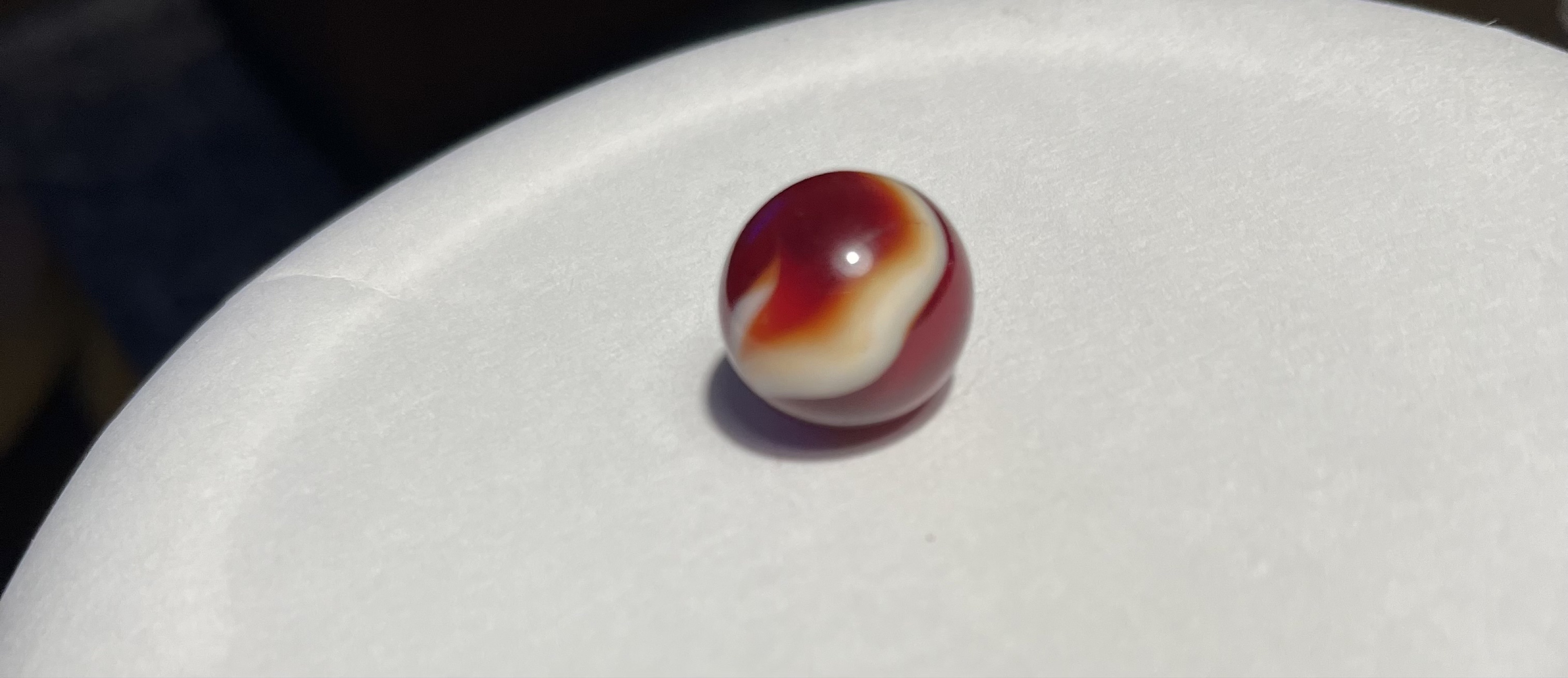 Prize Name / Cherry Red Popeye Hybrid by Akro Agate Company