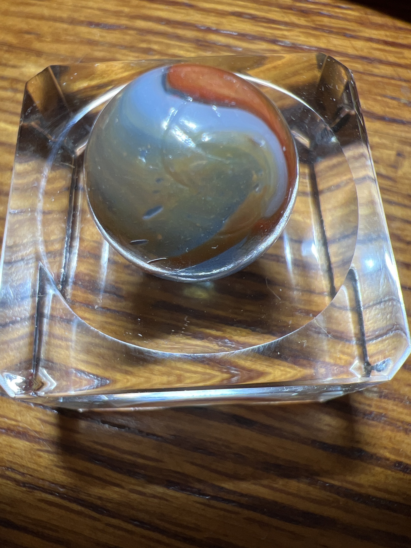 Transparent Blue with Orange Ribbon by Akro Agate Company