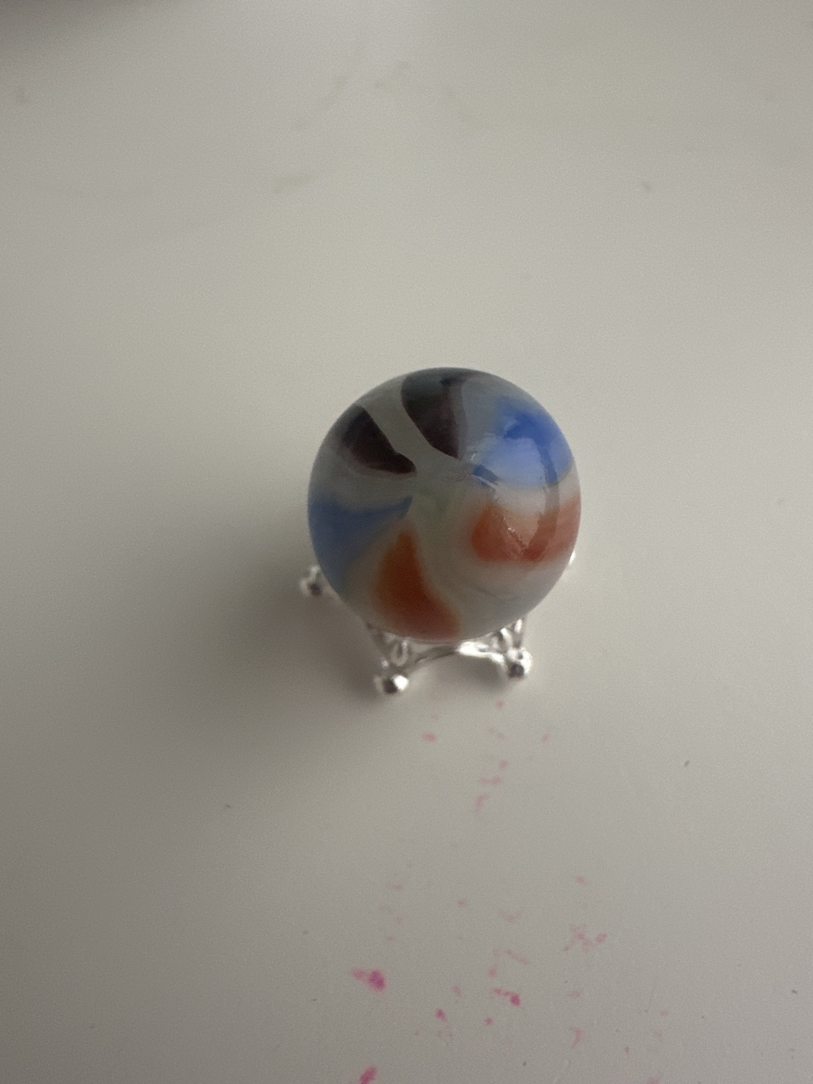 Orange, Blue, and Black Swirl by Vitro Agate Company