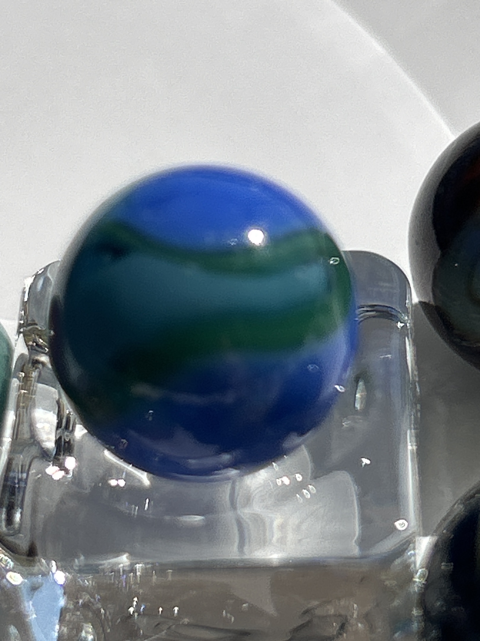 Blue Opaque with Green Patch by Vitro Agate Company, identification view