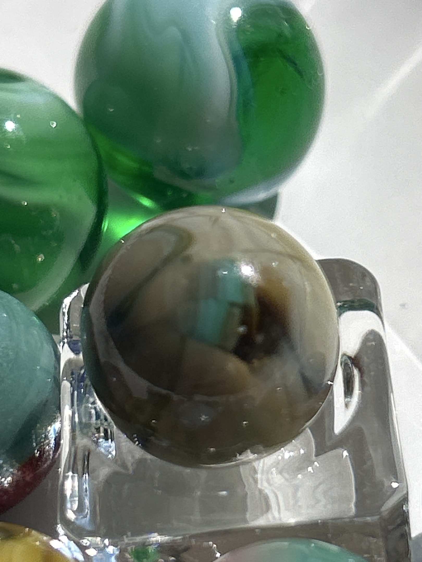 Root Beer Amber Cat's Eye by Vitro Agate, identification view