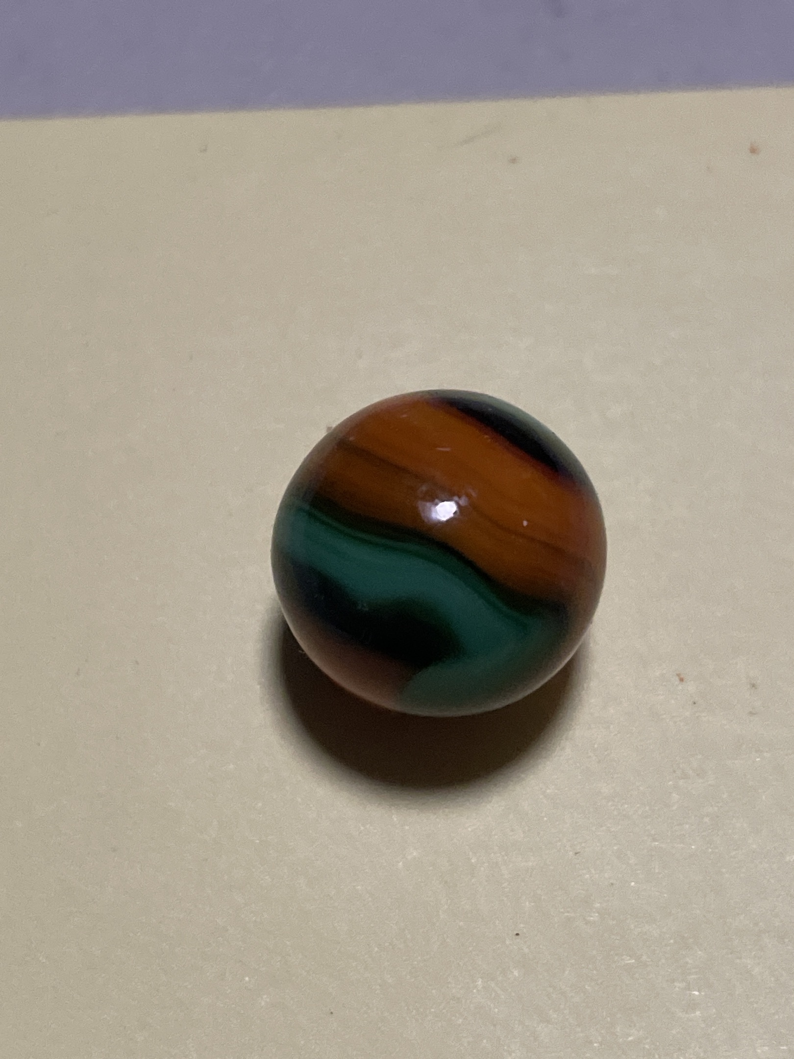 Conqueror - Rust Orange and Teal Green by Vitro Agate Company, identification view