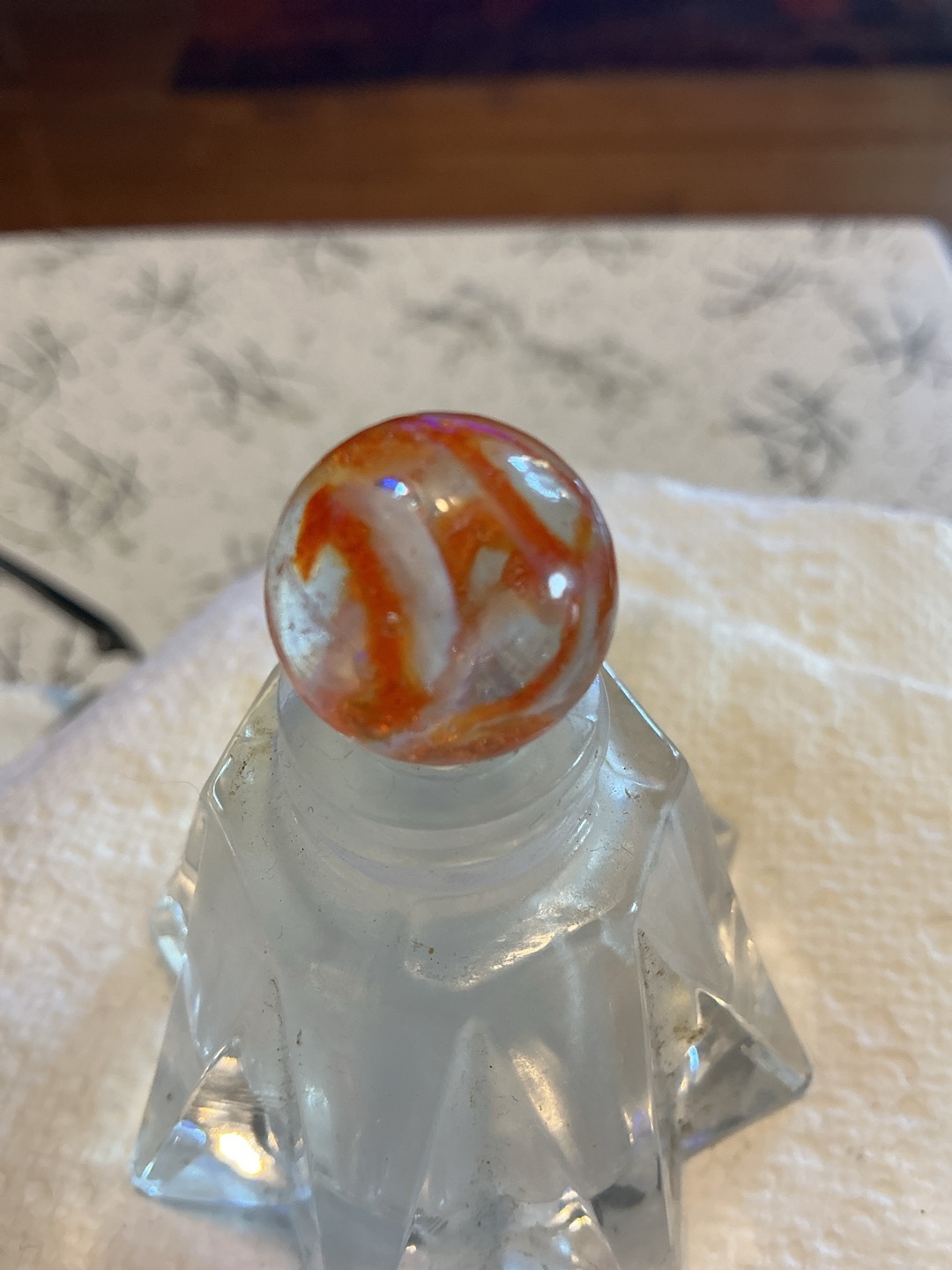 Iridescent Orange and White Swirl by Peltier Glass Company, identification view