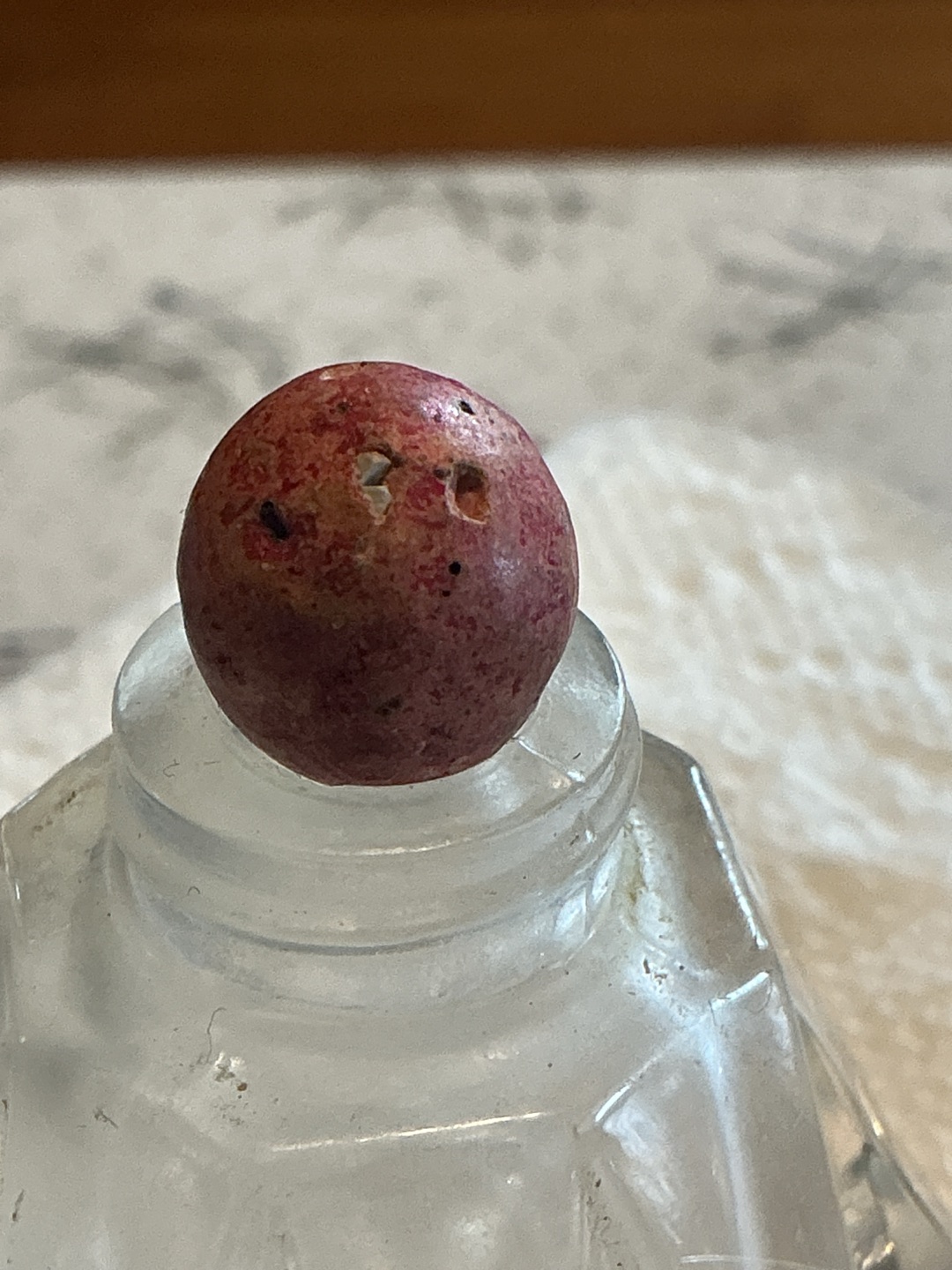 Dyed/Painted Red Clay (Commoney) by American Clay Works (or other early commercial clay marble producers), identification view