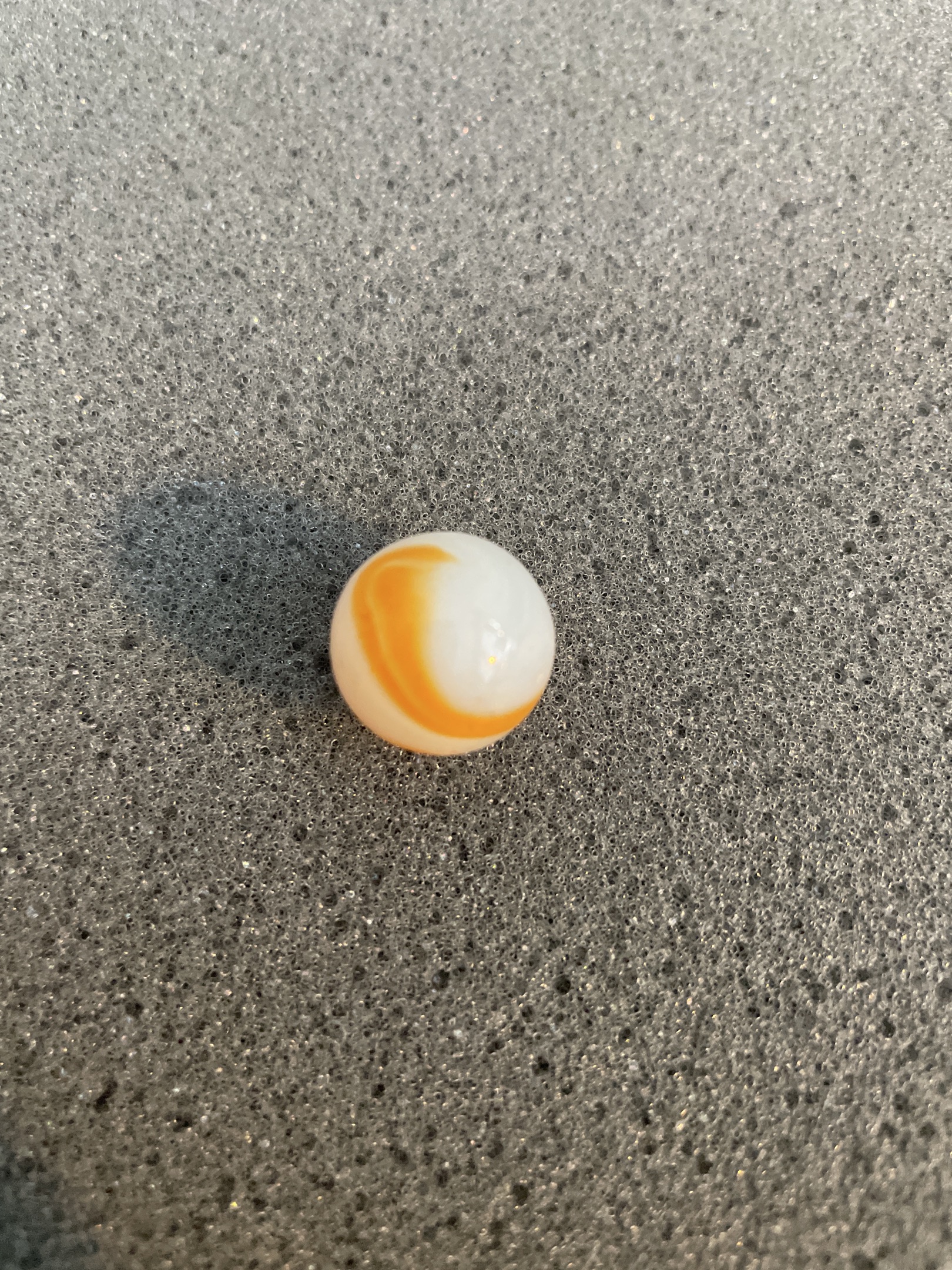 Orange and White Swirl by Akro Agate Company