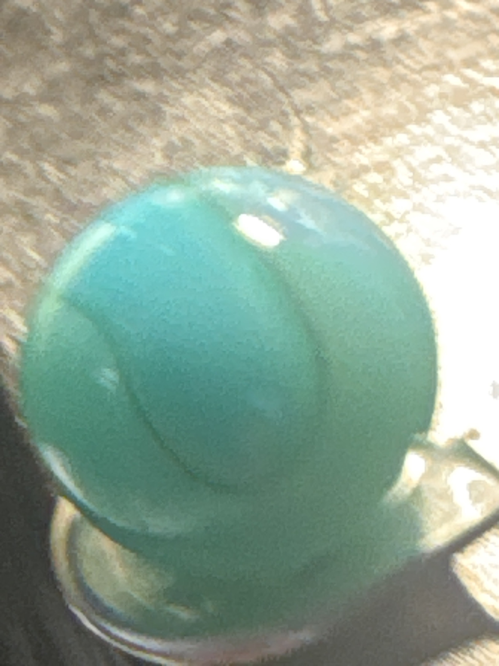 Teal/Green Game Marble by Akro Agate, identification view