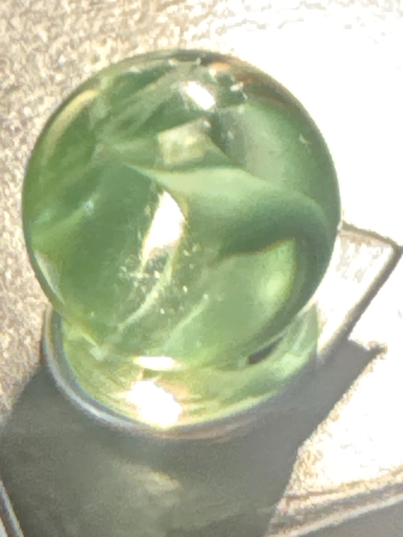 All-Red / Green Cage Cat's Eye by Vitro Agate Company, identification view