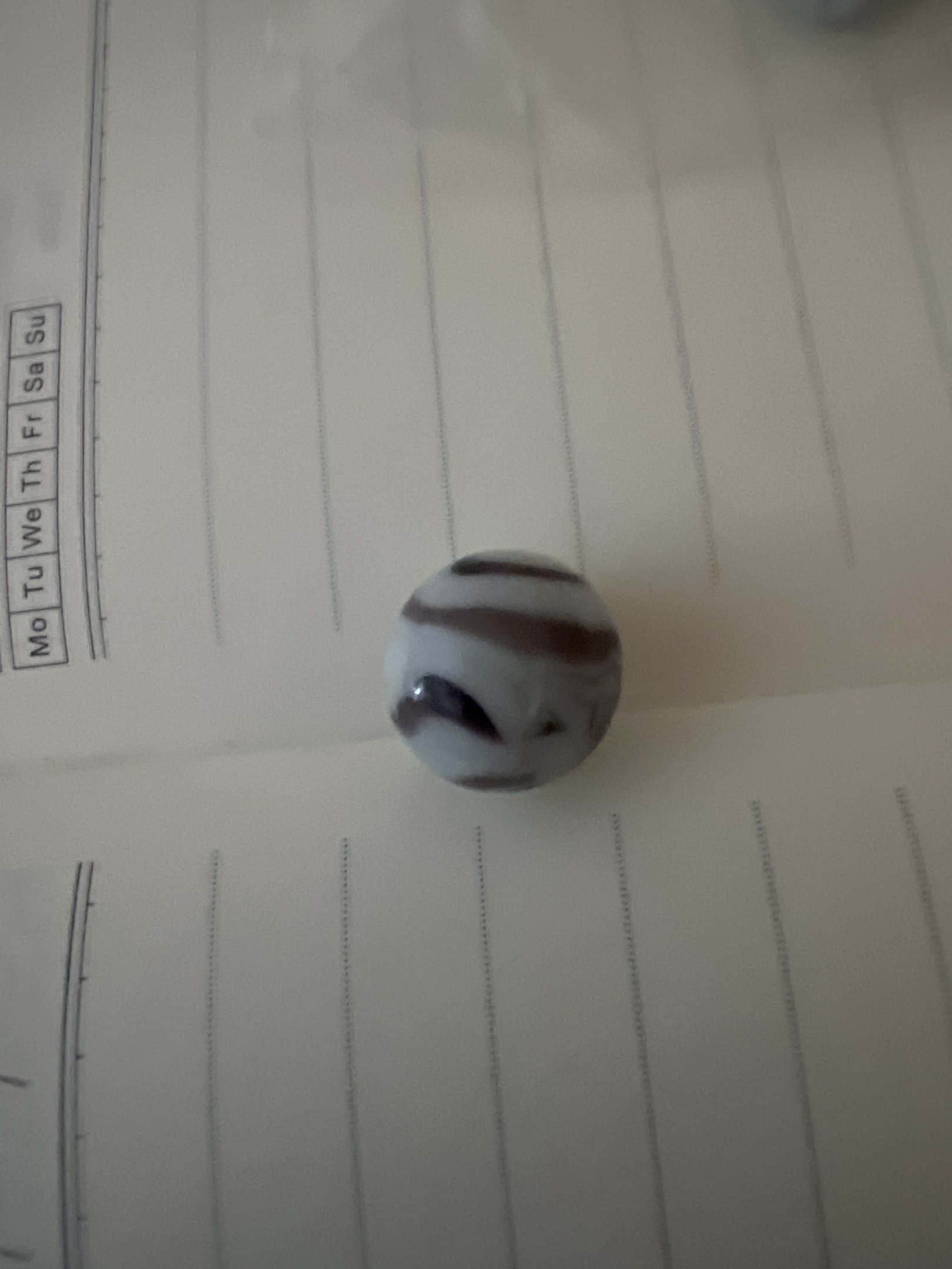 Brown and White Swirl by Akro Agate Company, identification view