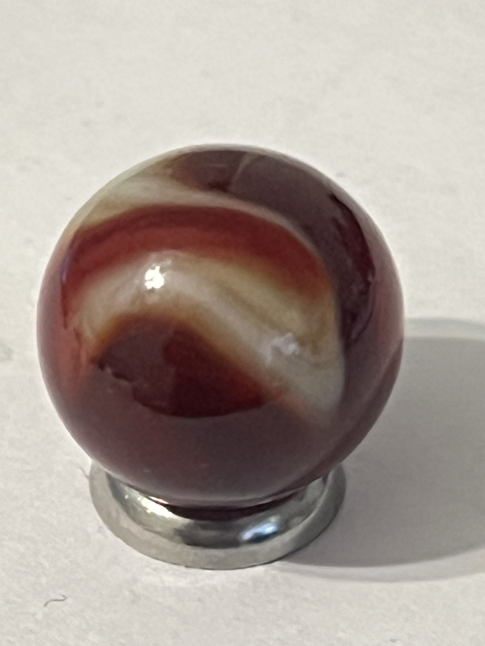 Oxblood Swirl (Red on White) by Akro Agate Company, identification view