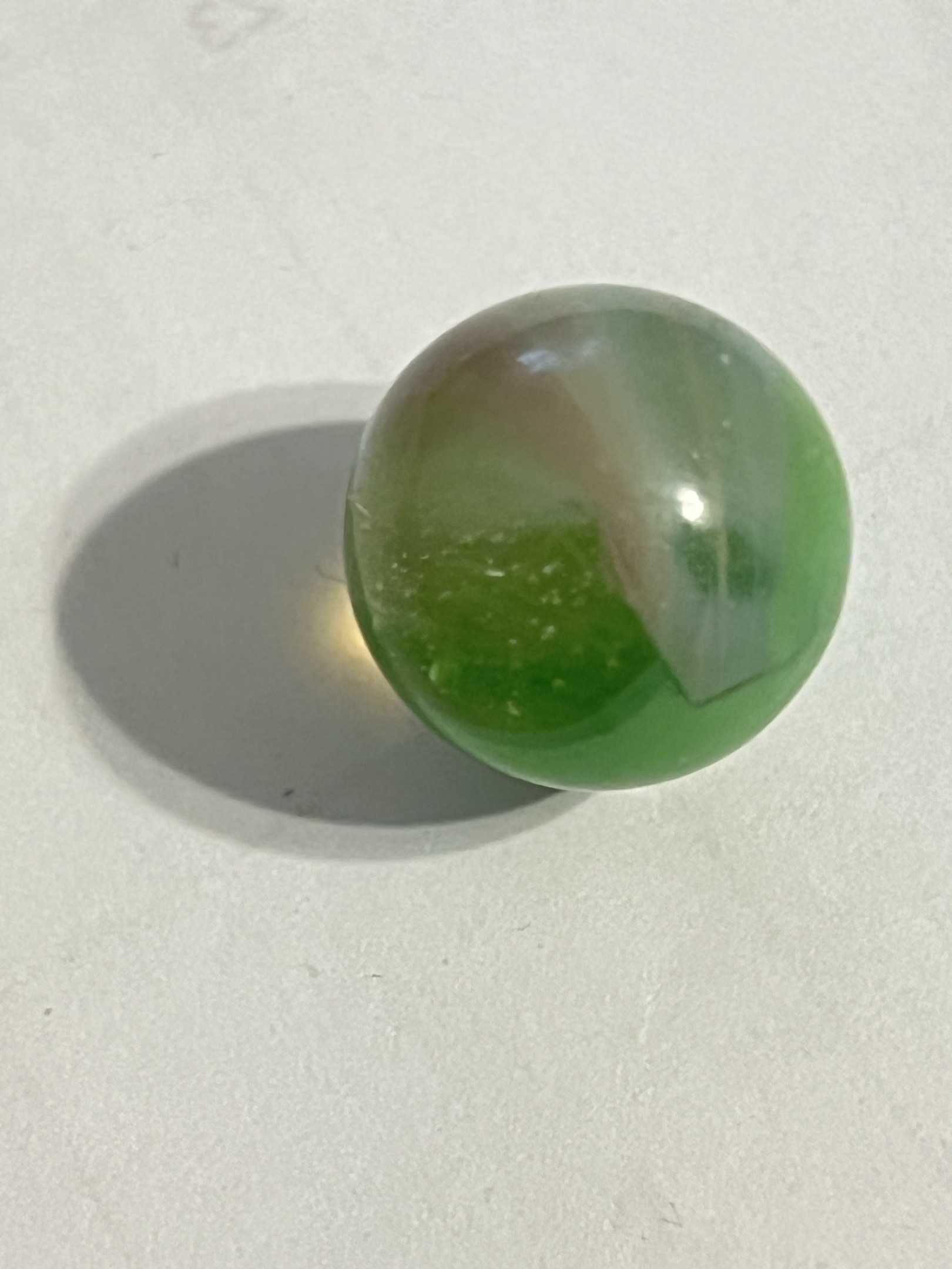 Green with Brown Swirl by Akro Agate Company, identification view