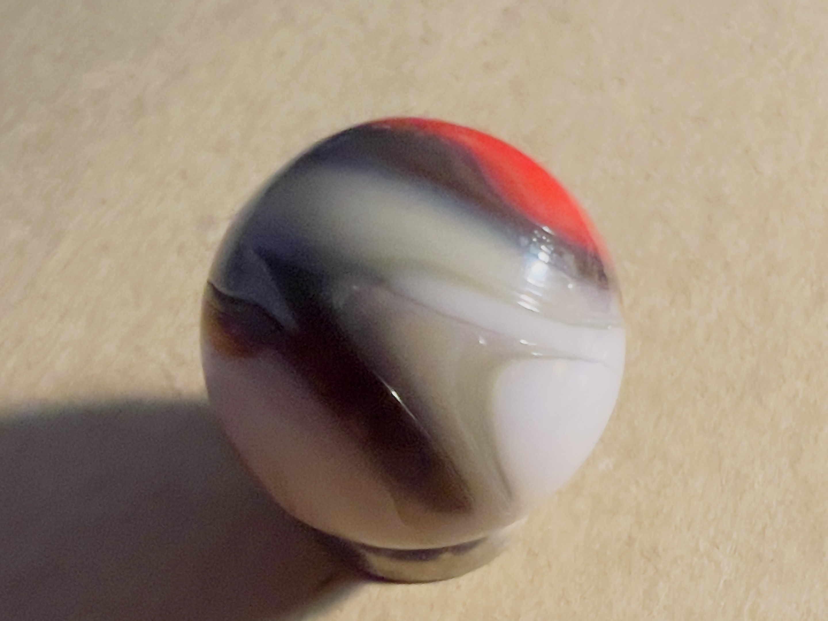 Prize Name (Orange and Brown) by Akro Agate Company, identification view