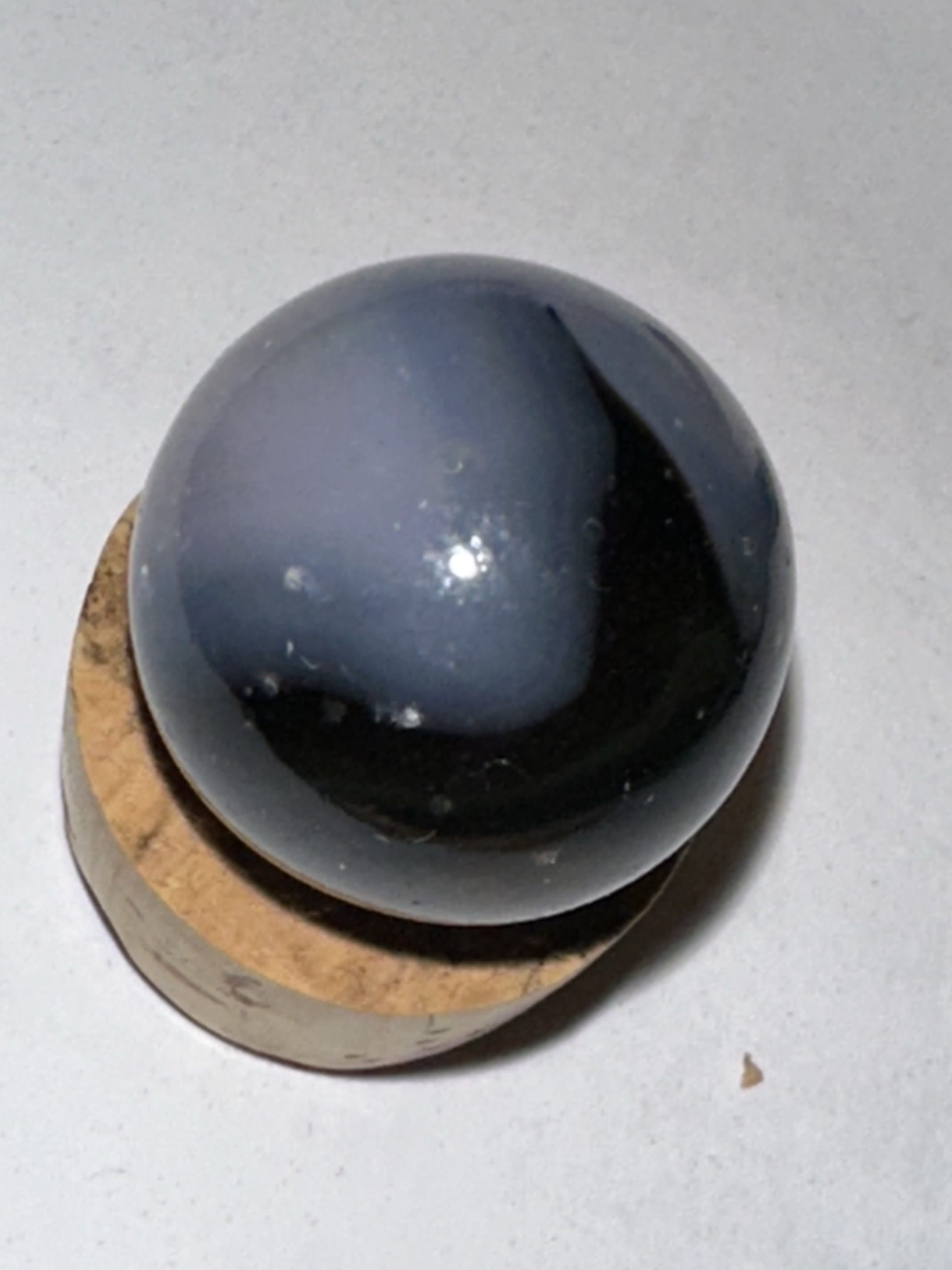Prize Name Swirl (Blue/Black) by Akro Agate Company, identification view