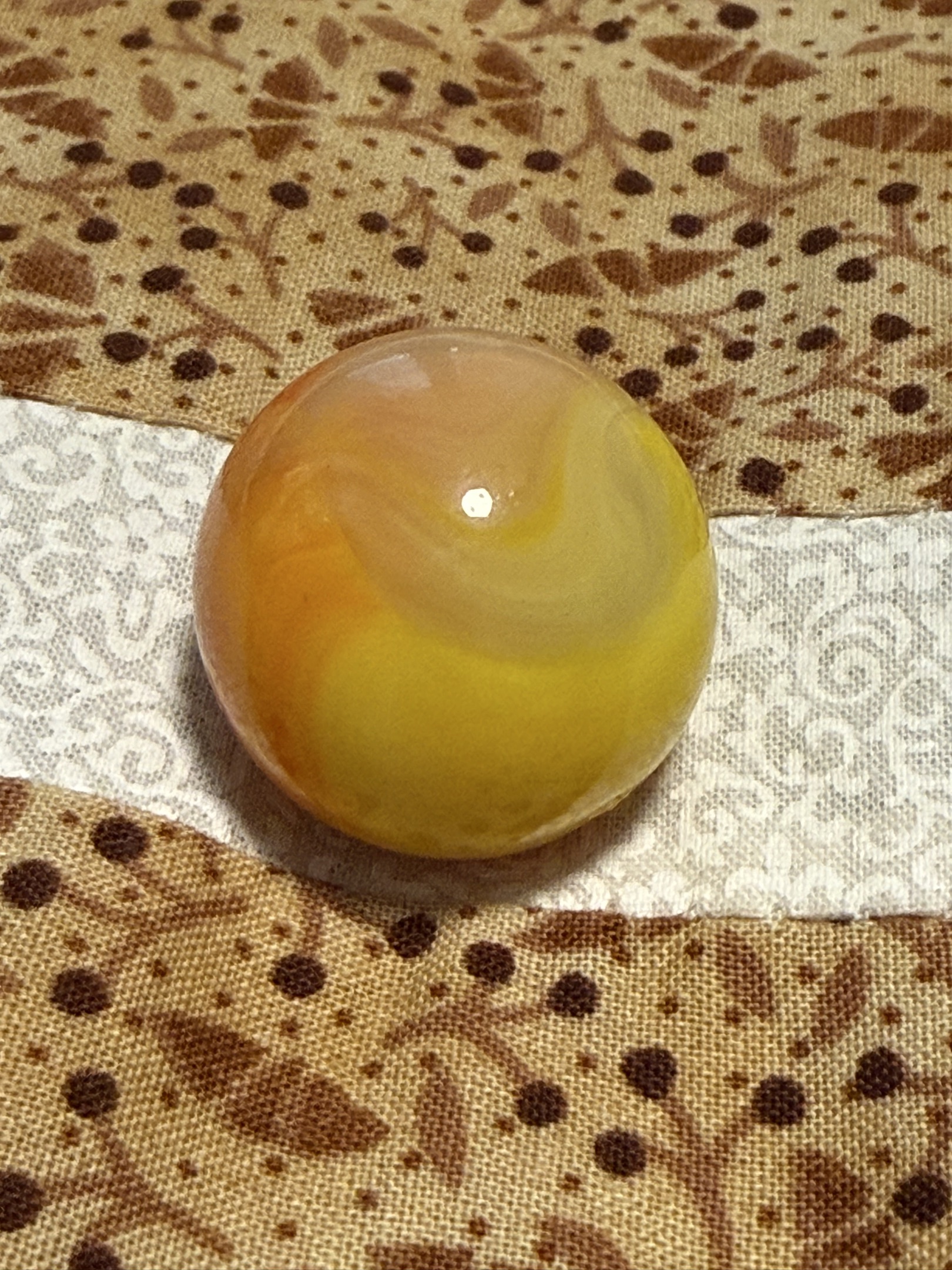 Orange and Yellow Slag Shooter by Akro Agate Company