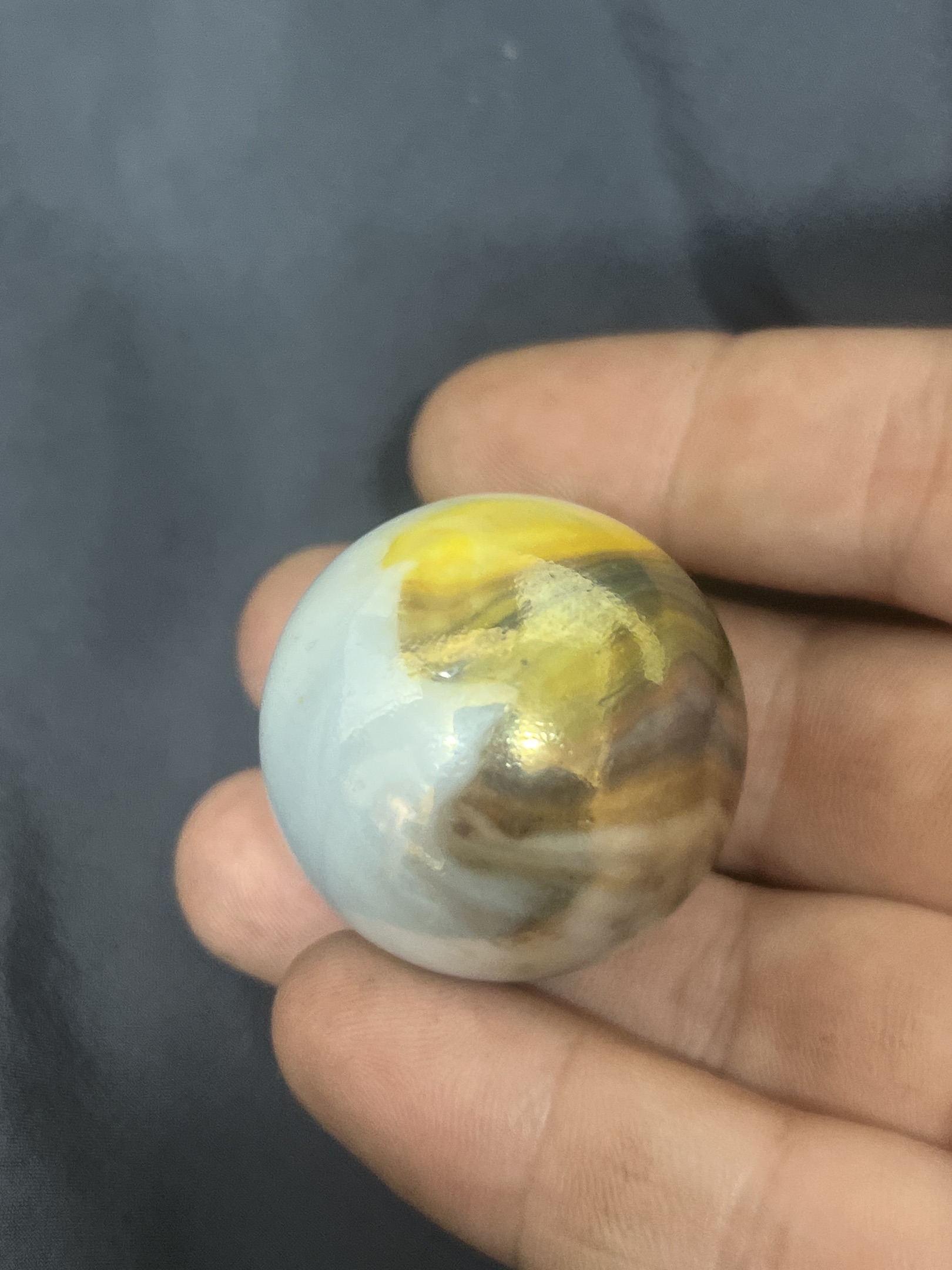Yellow and Brown Swirl by Akro Agate Company