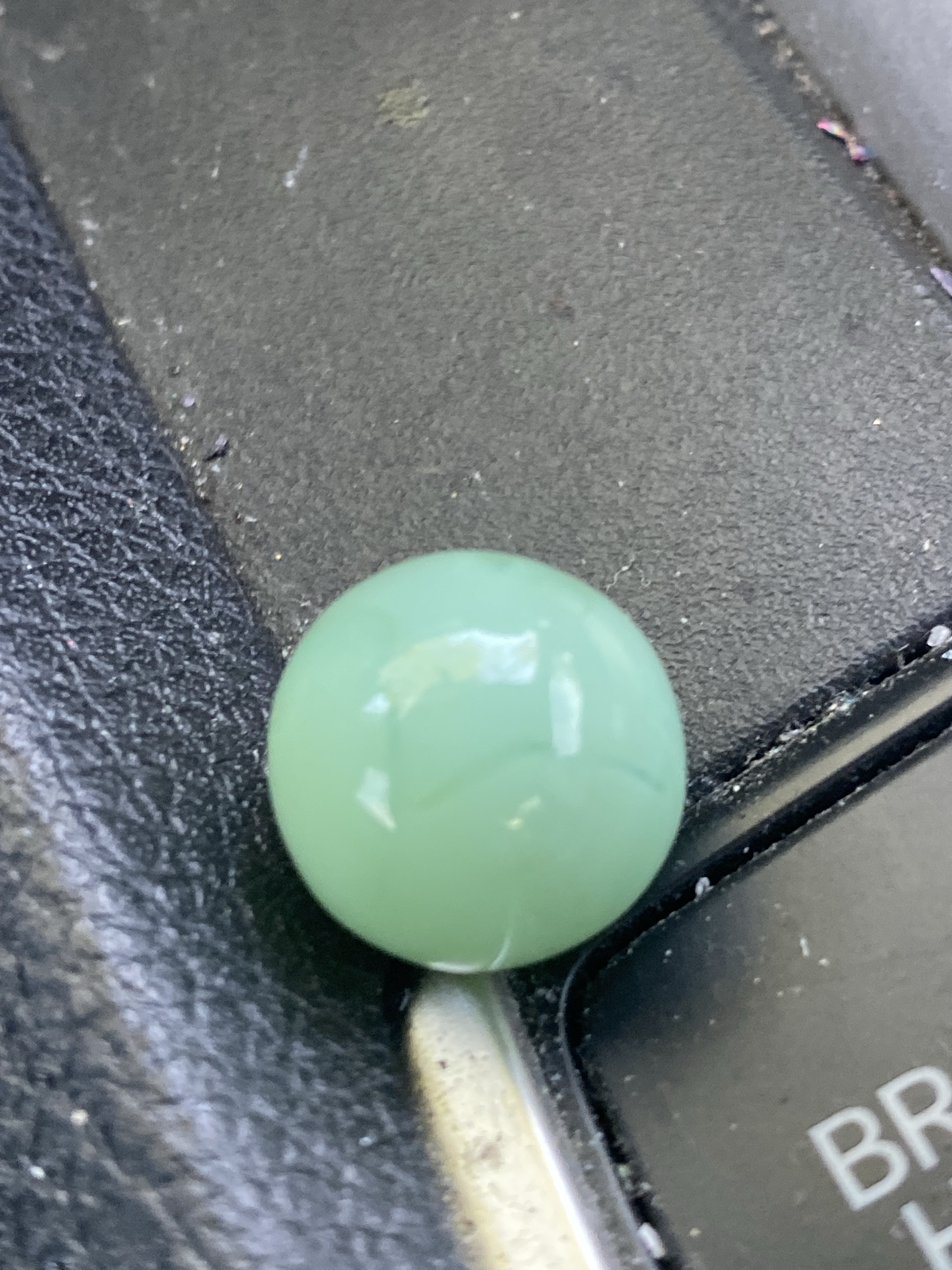 Jadeite Green Shooter by Akro Agate Company, identification view