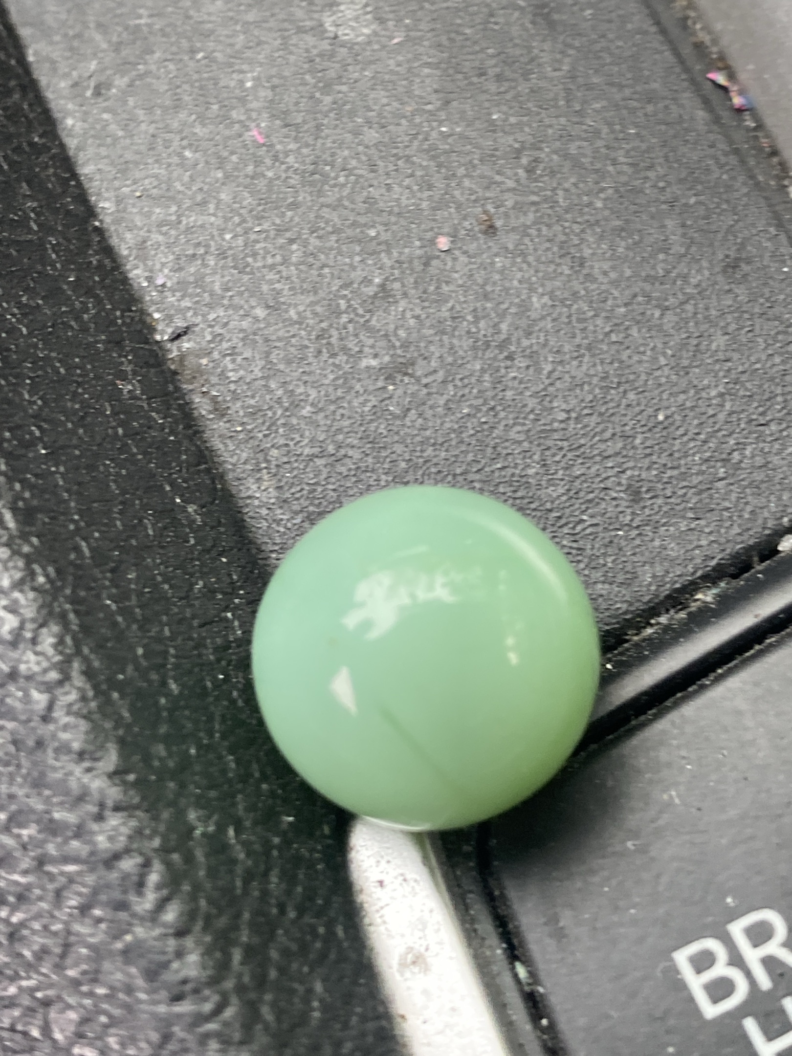 Jadeite Green Shooter by Akro Agate Company, identification view