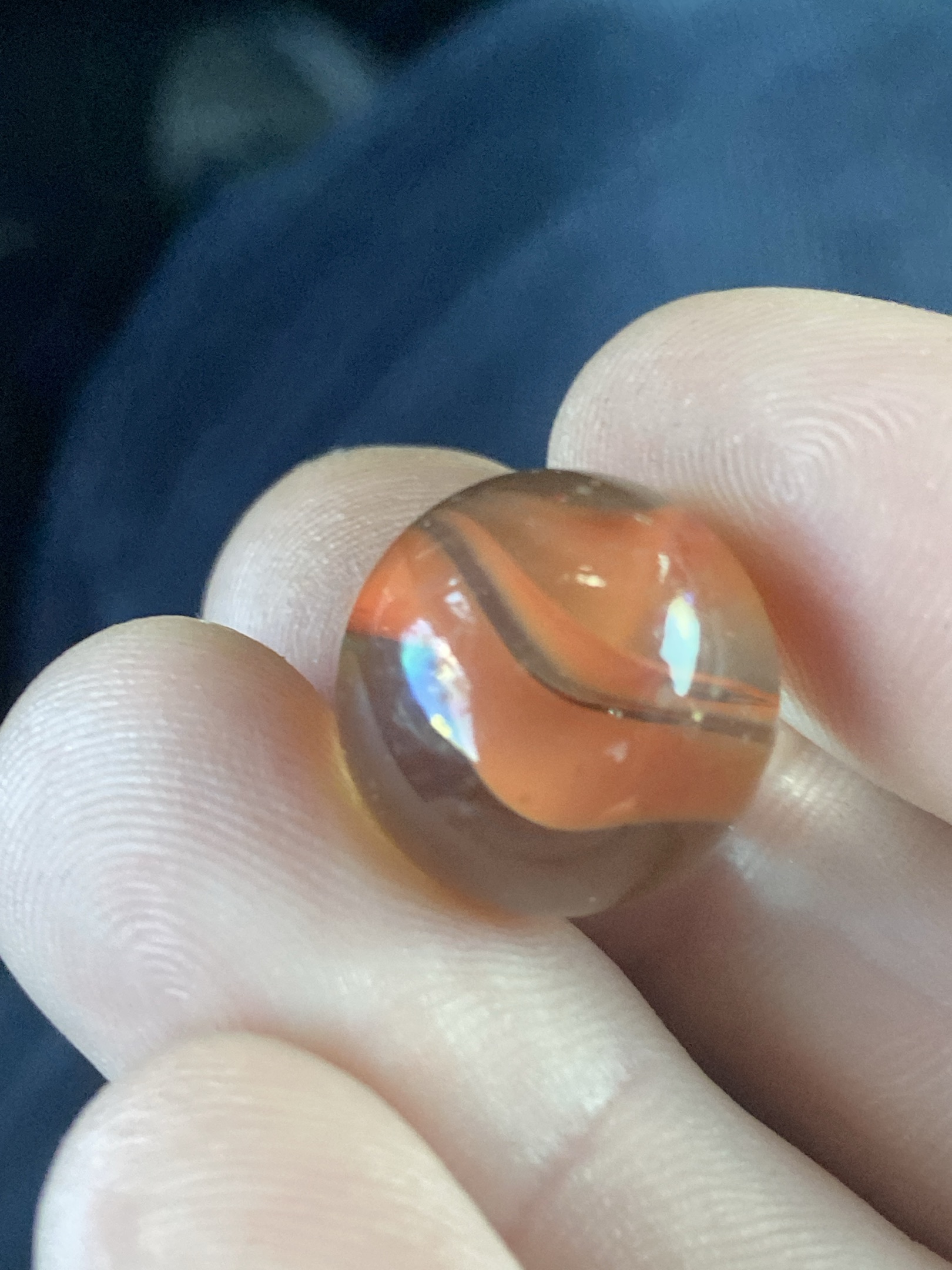 Cage Cat's Eye (Orange & Black) by Vitro Agate Company, identification view
