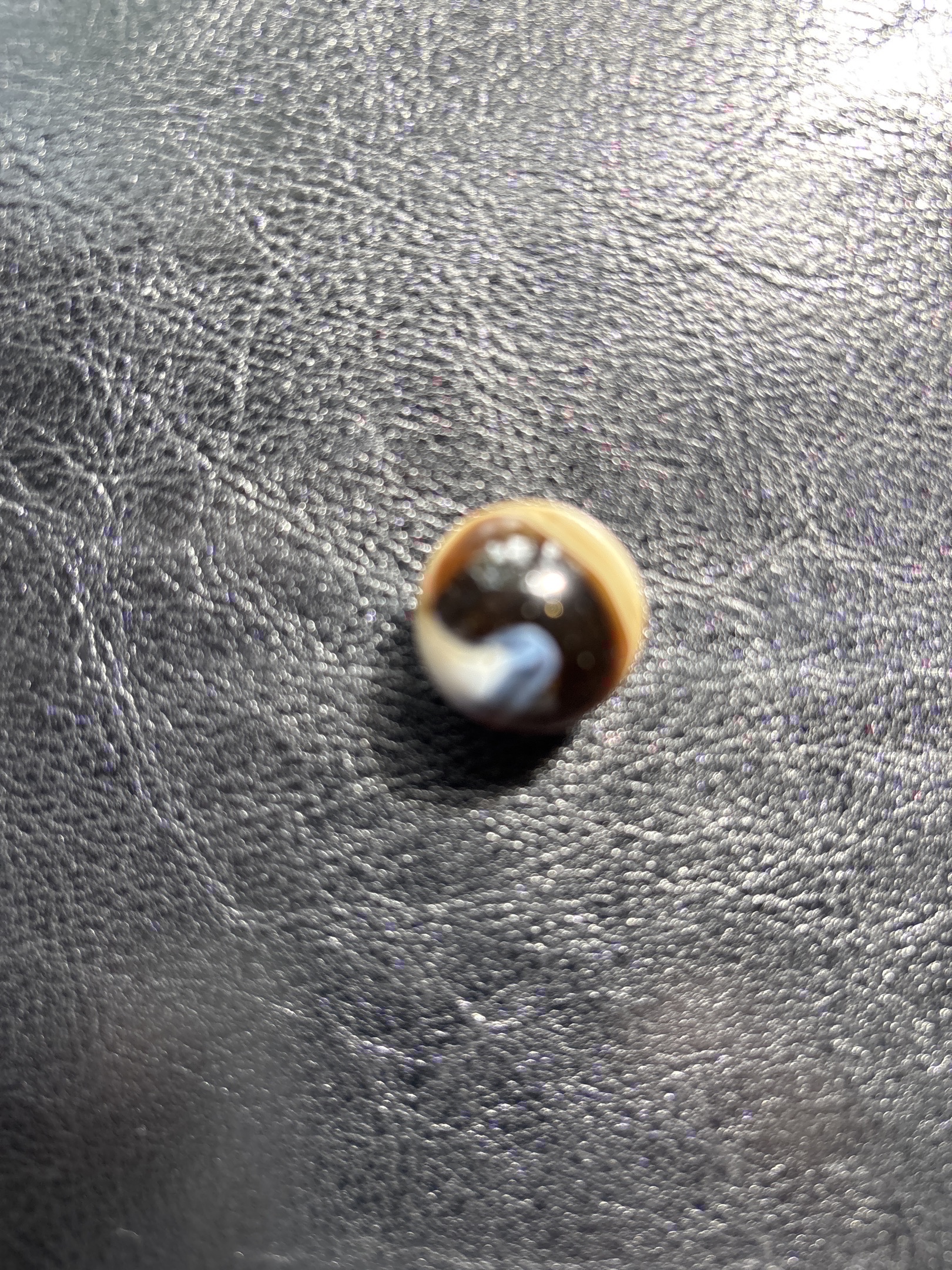 Brown Corkscrew with Cream and Blue by Akro Agate, identification view