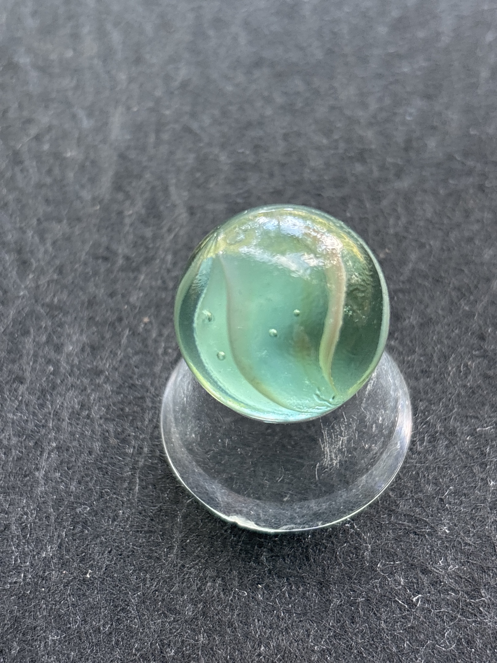 Green Tint with White Vane Cat's Eye by Vitro Agate Company, identification view