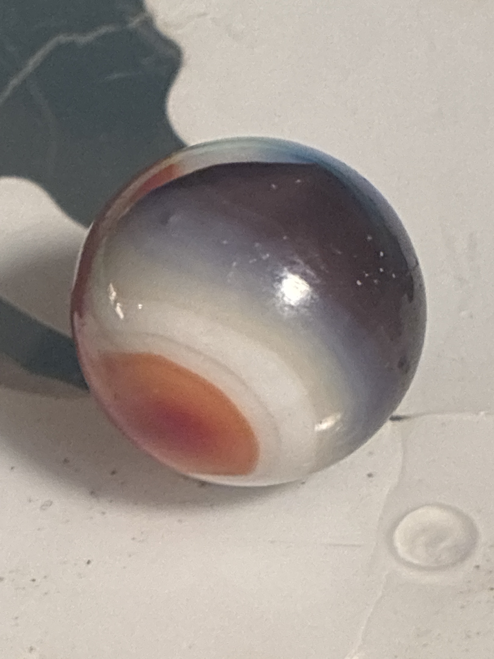 Red, White, and Blue Tri-Lite Swirl by Vitro Agate Company, identification view