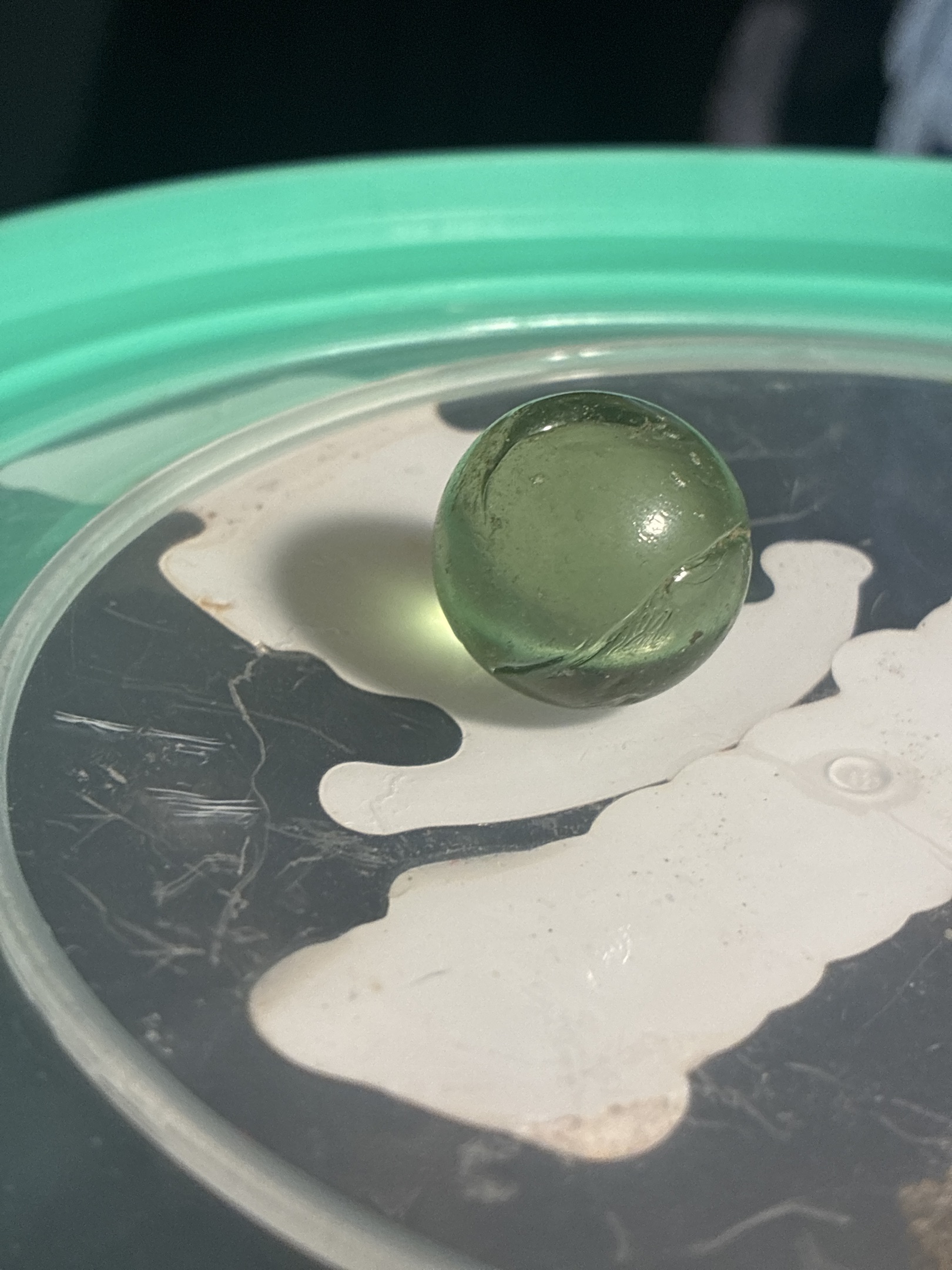 Transparent Green Shooter by Akro Agate Company, identification view