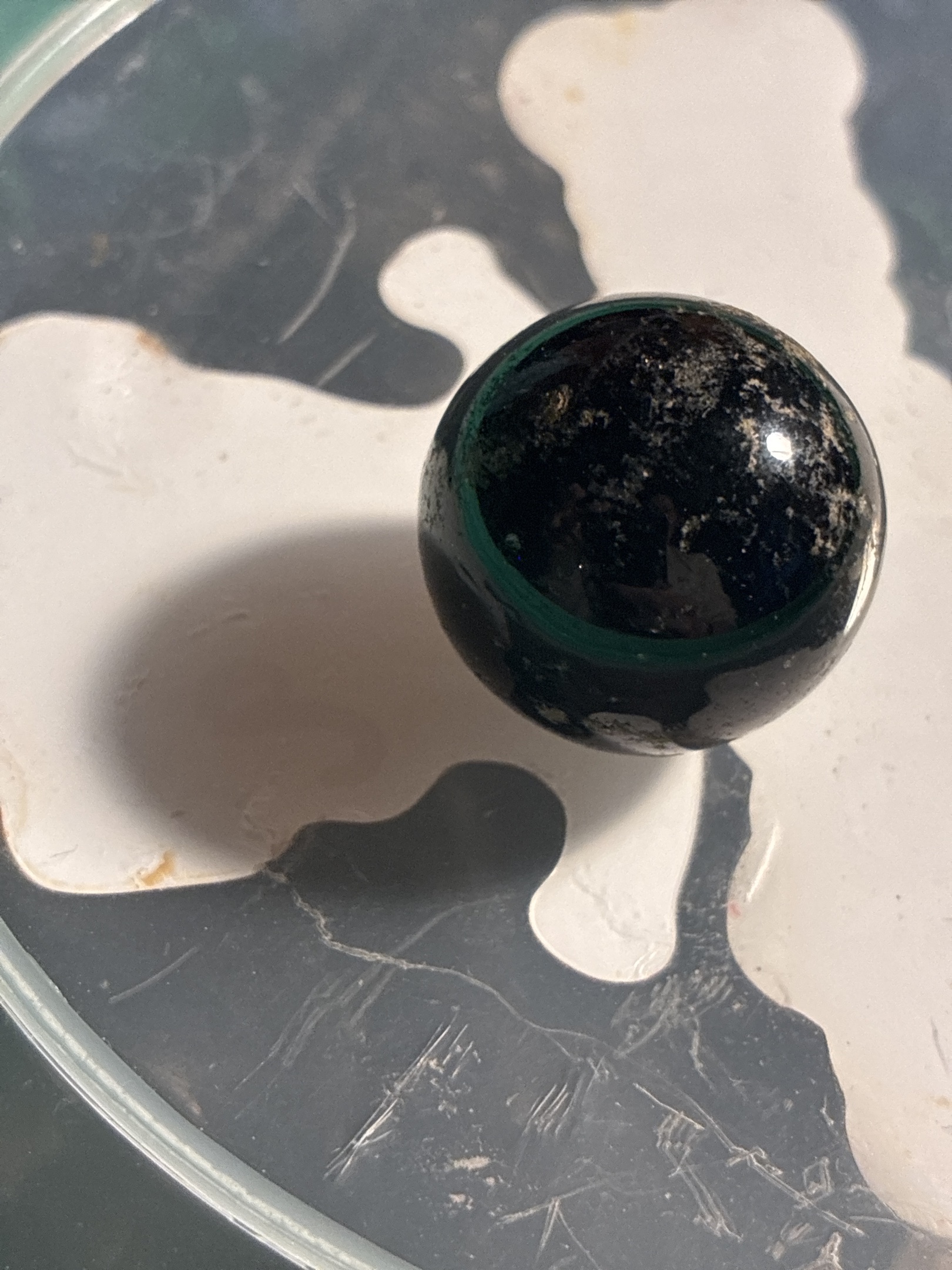 Black Emerald Shooter by Vitro Agate Company, identification view