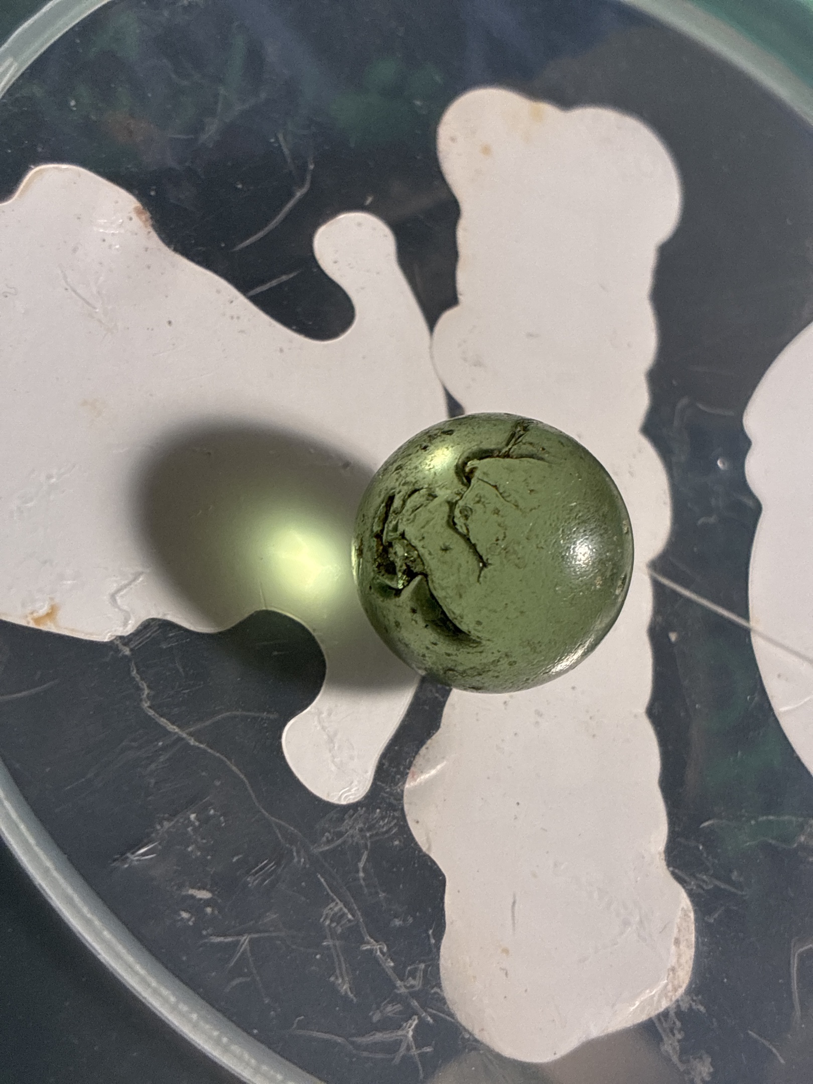 Transparent Green Shooter by Akro Agate Company, identification view