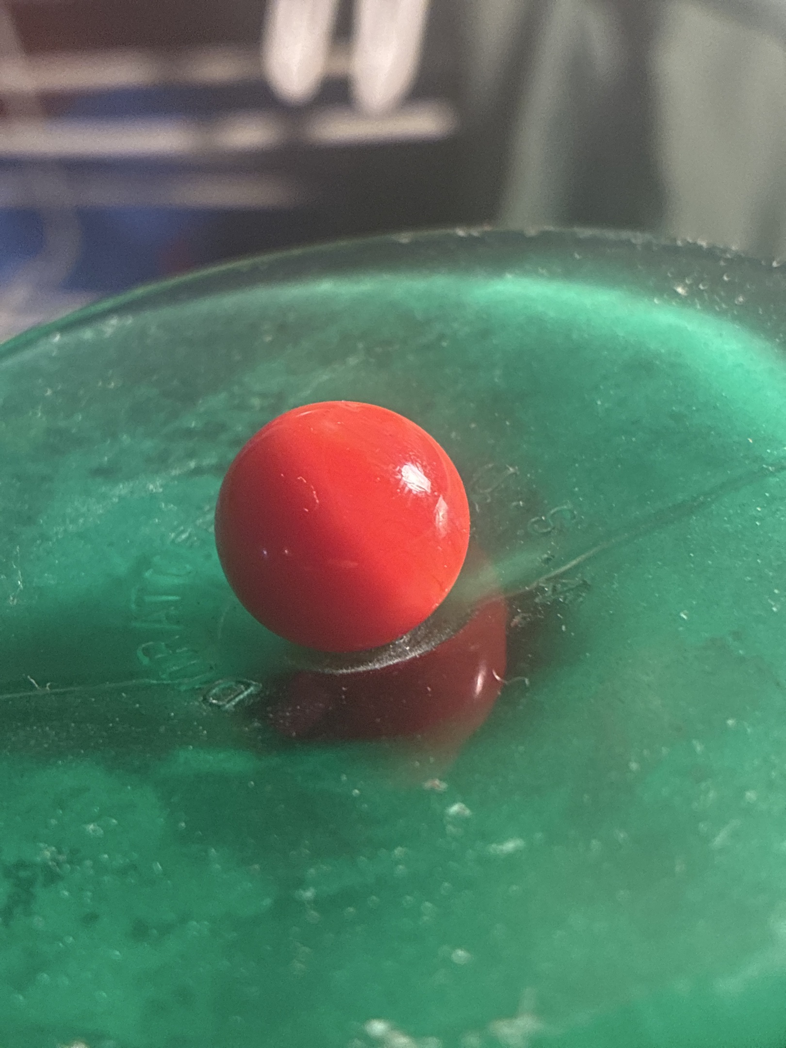 Opaque Red Game Marble by Akro Agate Company, identification view