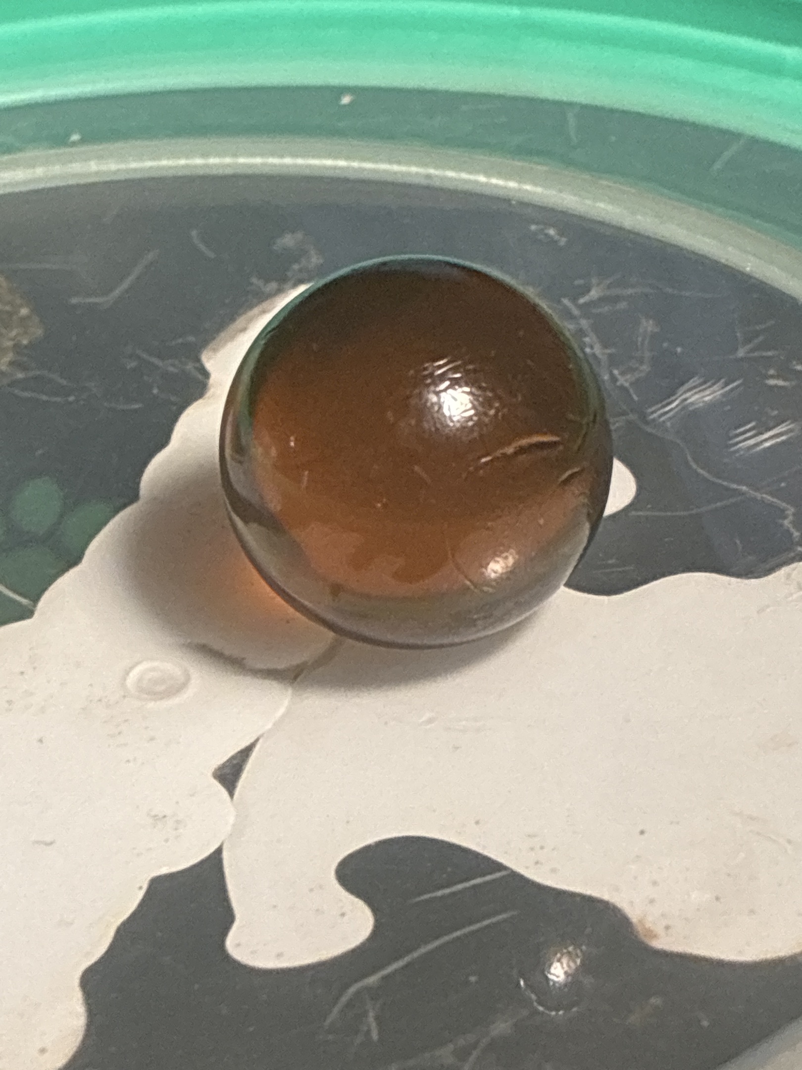 Amber Clearie / Single-color Transparent by Akro Agate, identification view