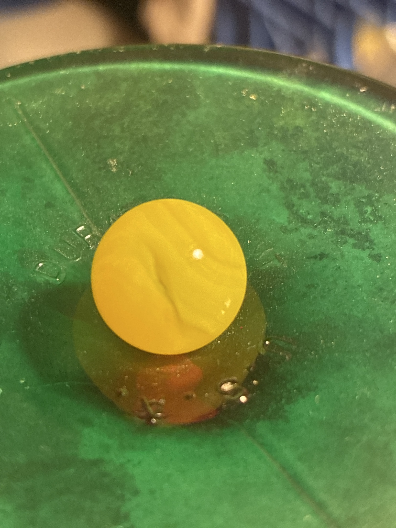 Solid Yellow Game Marble by Peltier Glass Company, identification view