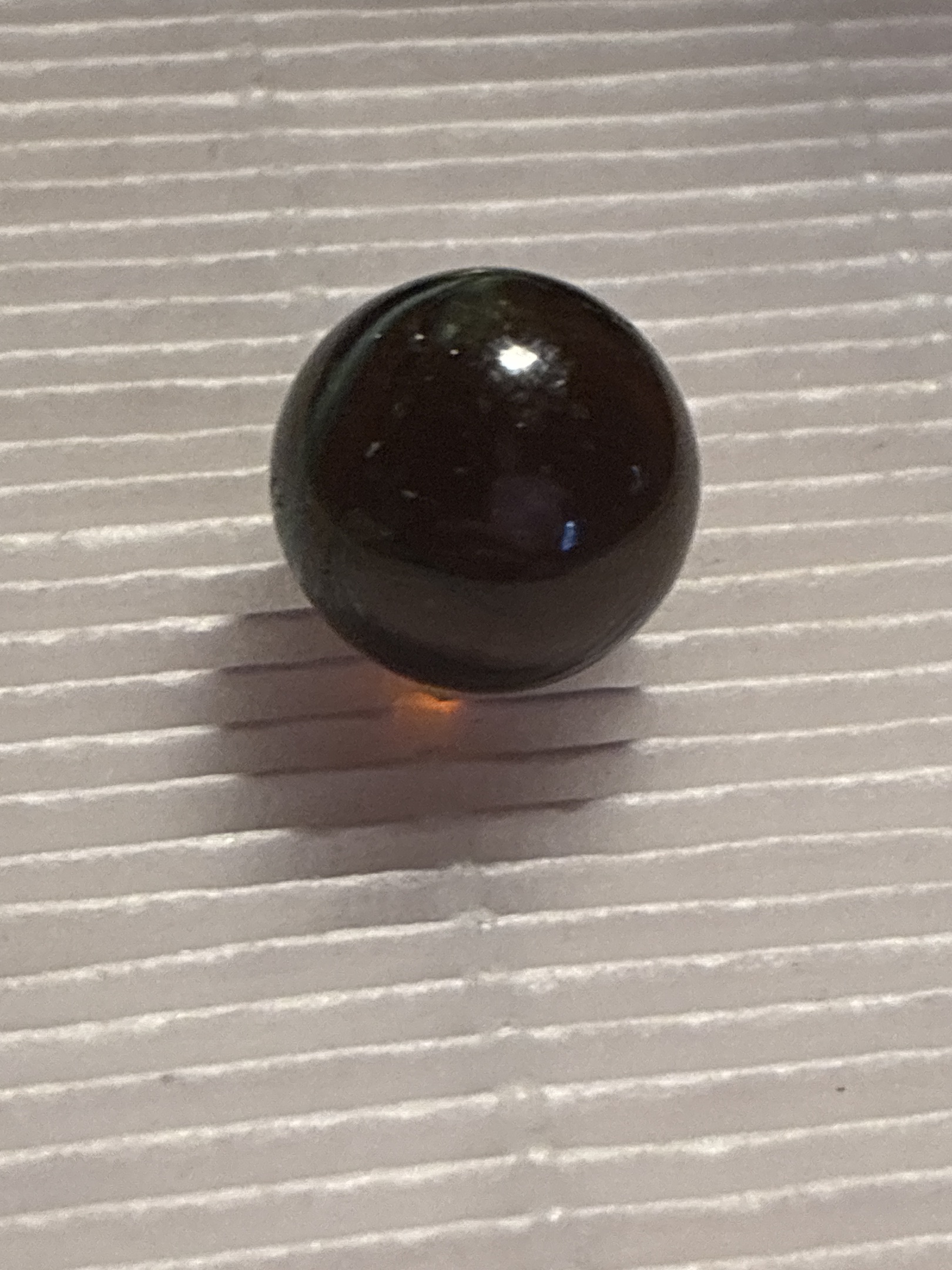 Amber / Brown Game Marble by Akro Agate, identification view