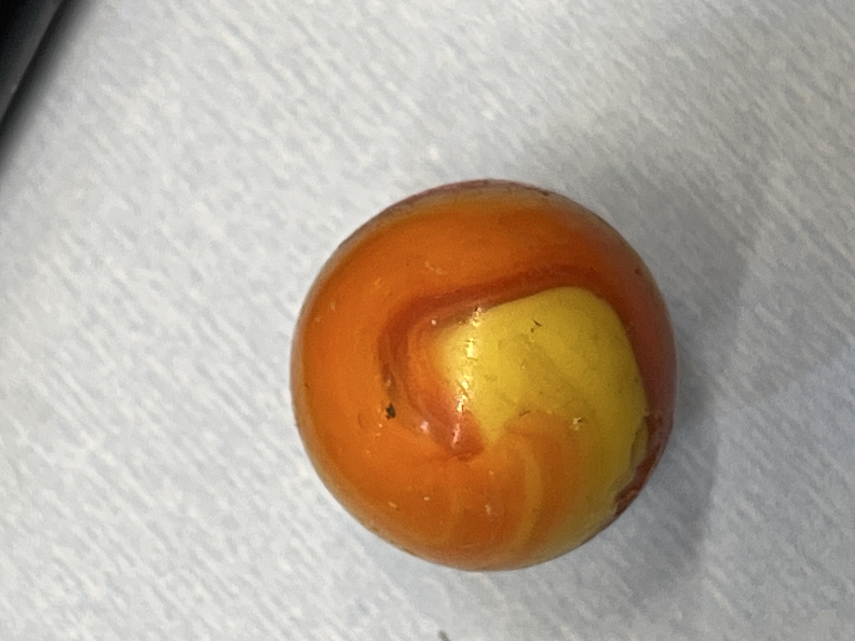 Orange and Yellow Corkscrew by Akro Agate Company
