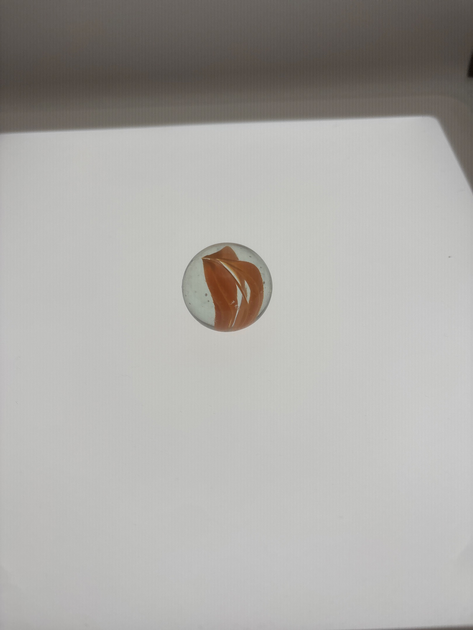 Orange Cat's Eye Shooter by Vitro Agate Company, identification view