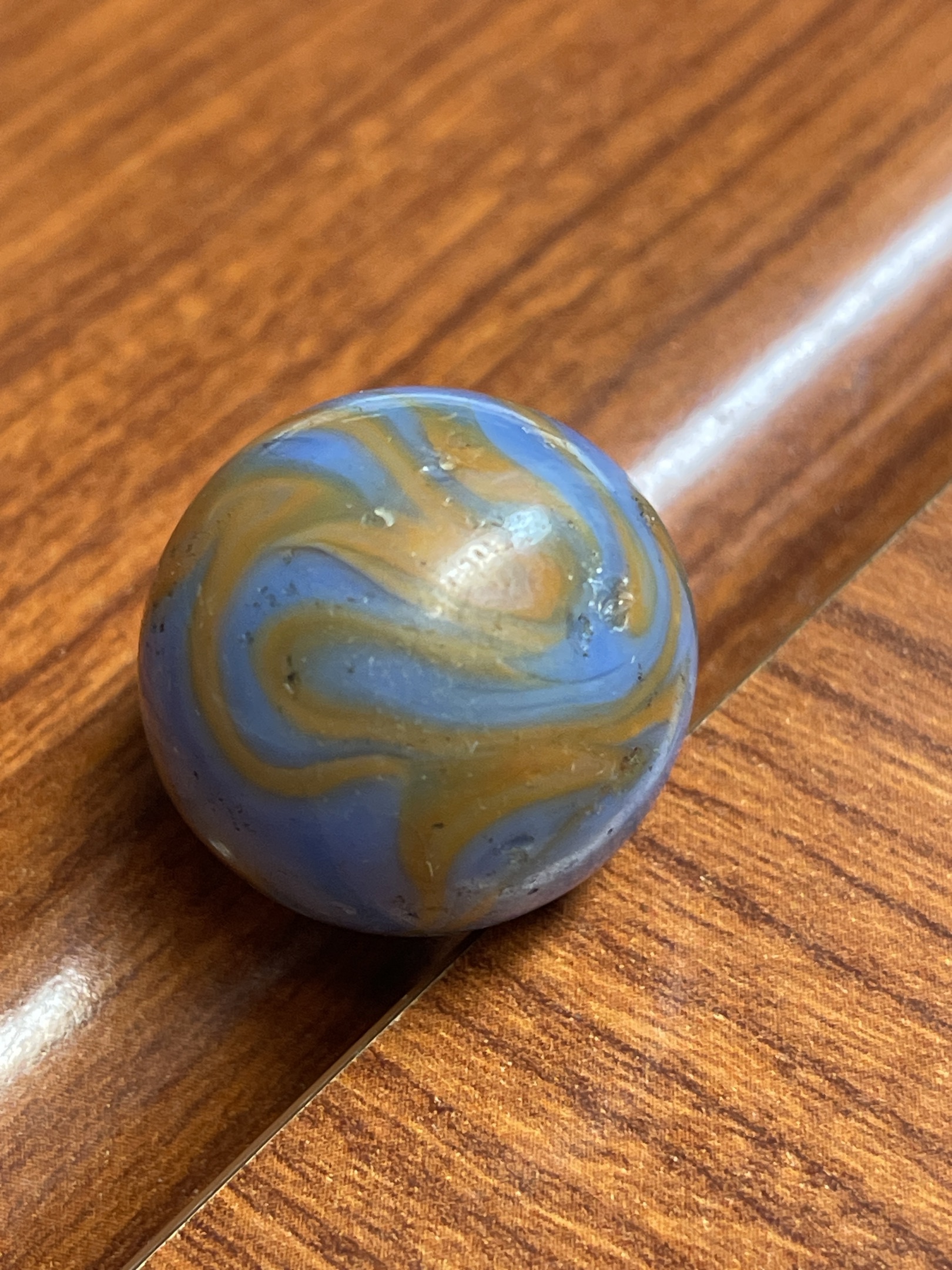 Blue with Butterscotch Special by Akro Agate, identification view