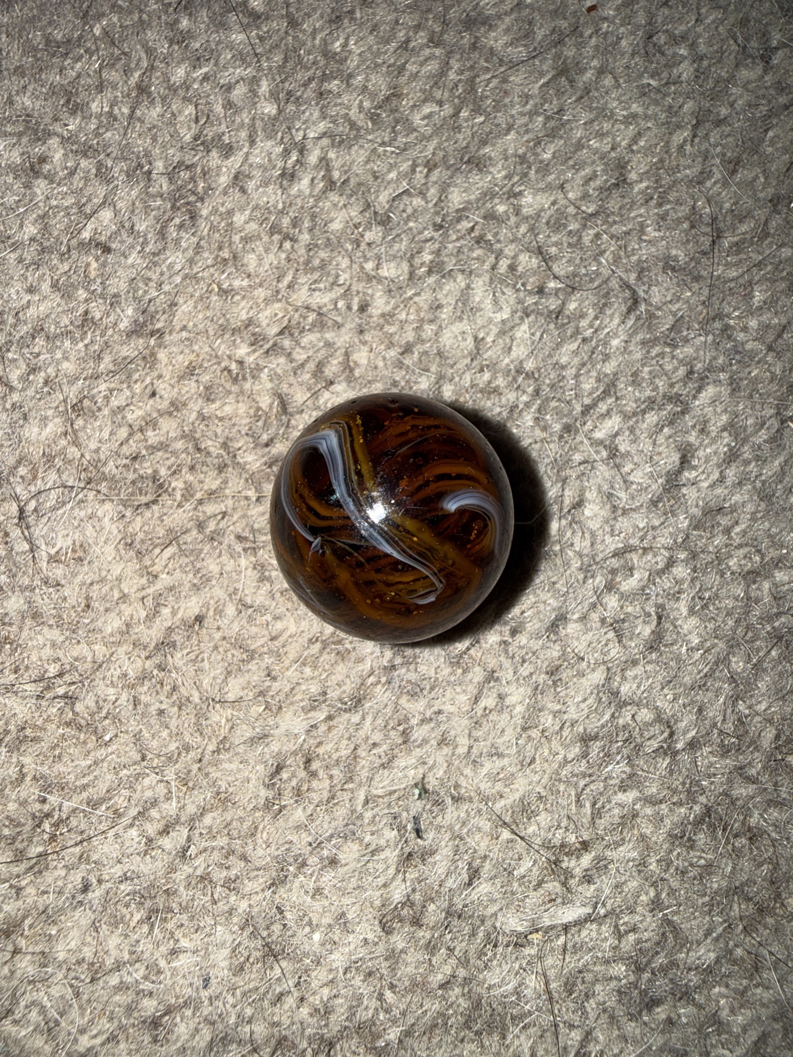 Brown Amber Corkscrew by Akro Agate, identification view