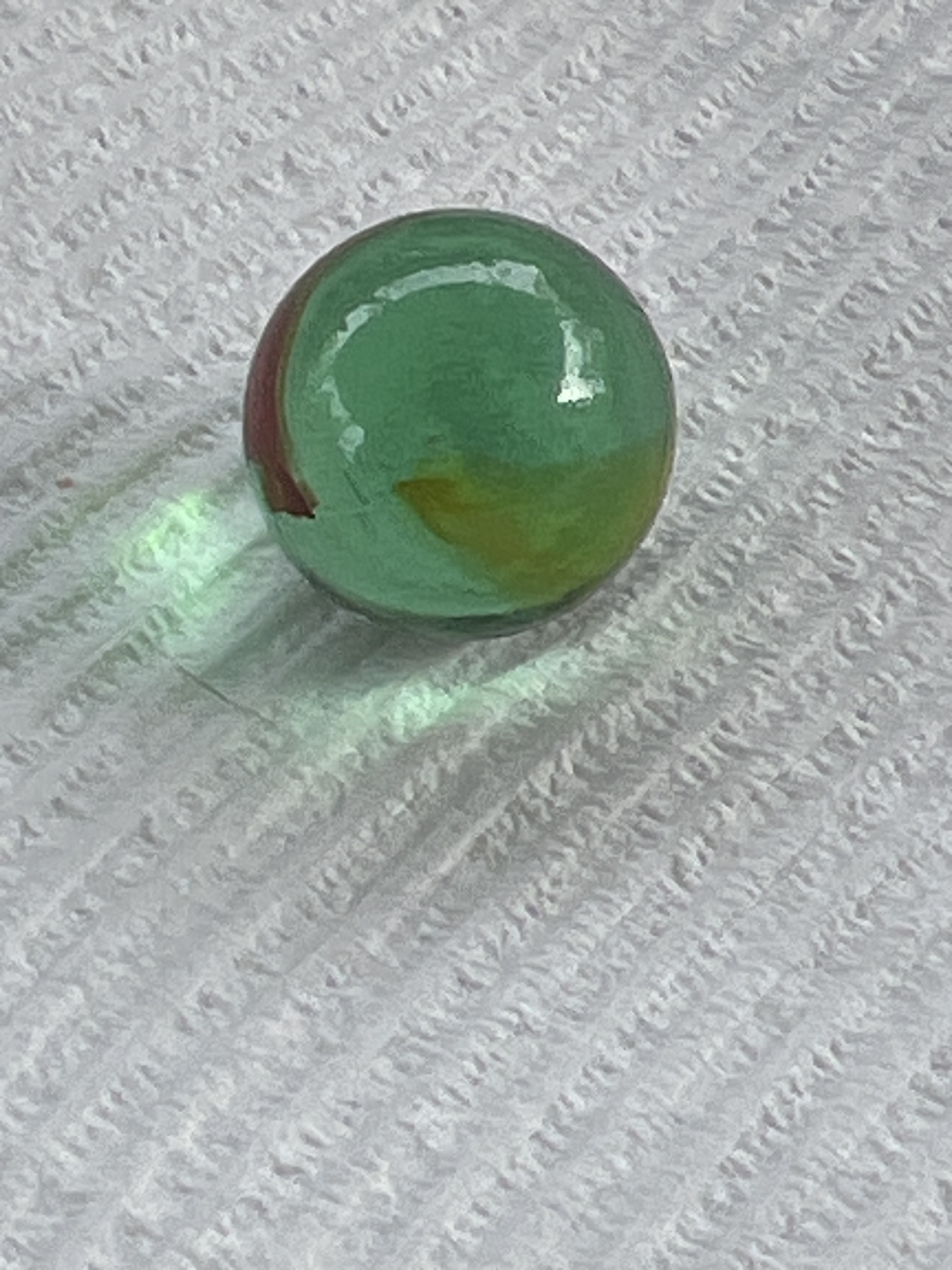 Transparent Green with Red and Yellow Ribbons by Peltier Glass Company