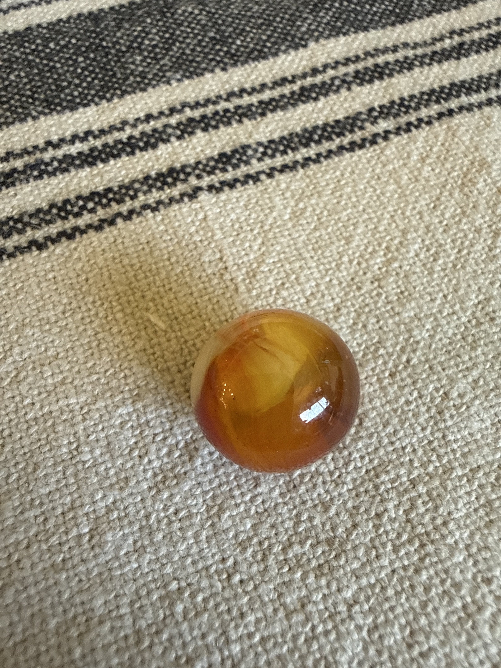 Amber Oxblood by Akro Agate Company
